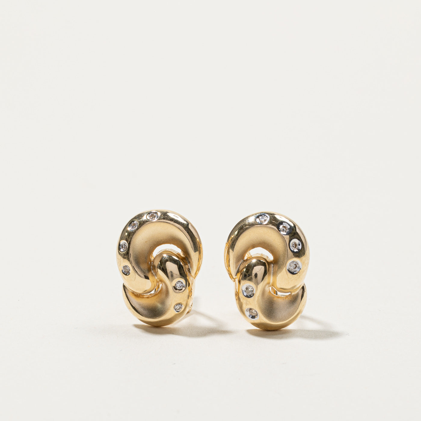Flush Set Diamond Knot Earrings | 0.12ctw |