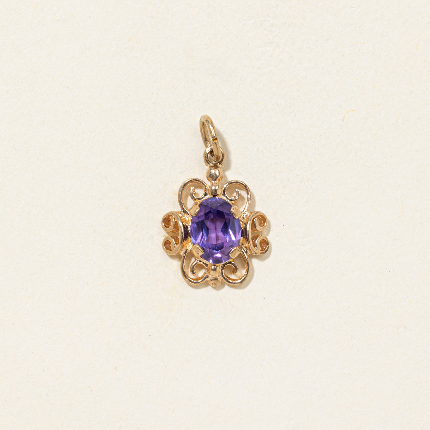 Oval Cut Amethyst Scrollwork Pendant