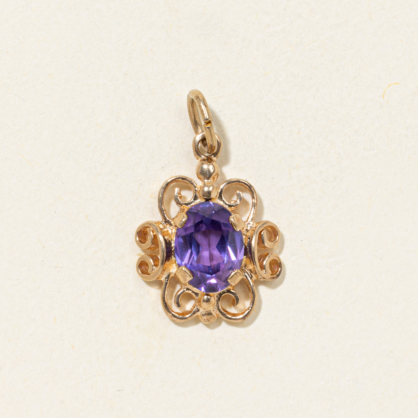 Oval Cut Amethyst Scrollwork Pendant