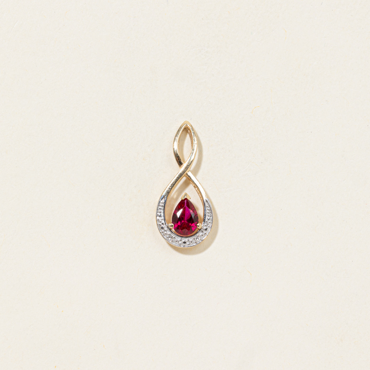 Pear Cut Synthetic Ruby & Diamond Crossover Pendant