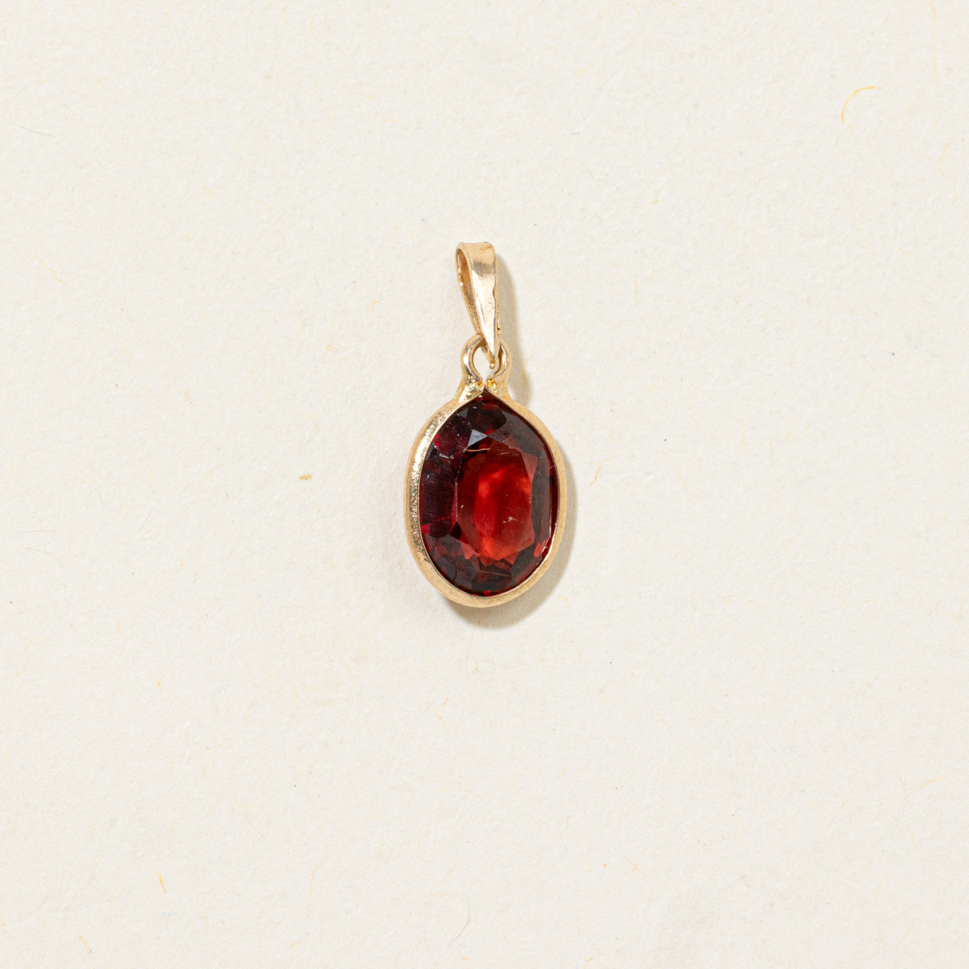 Bezel Set Garnet Pendant