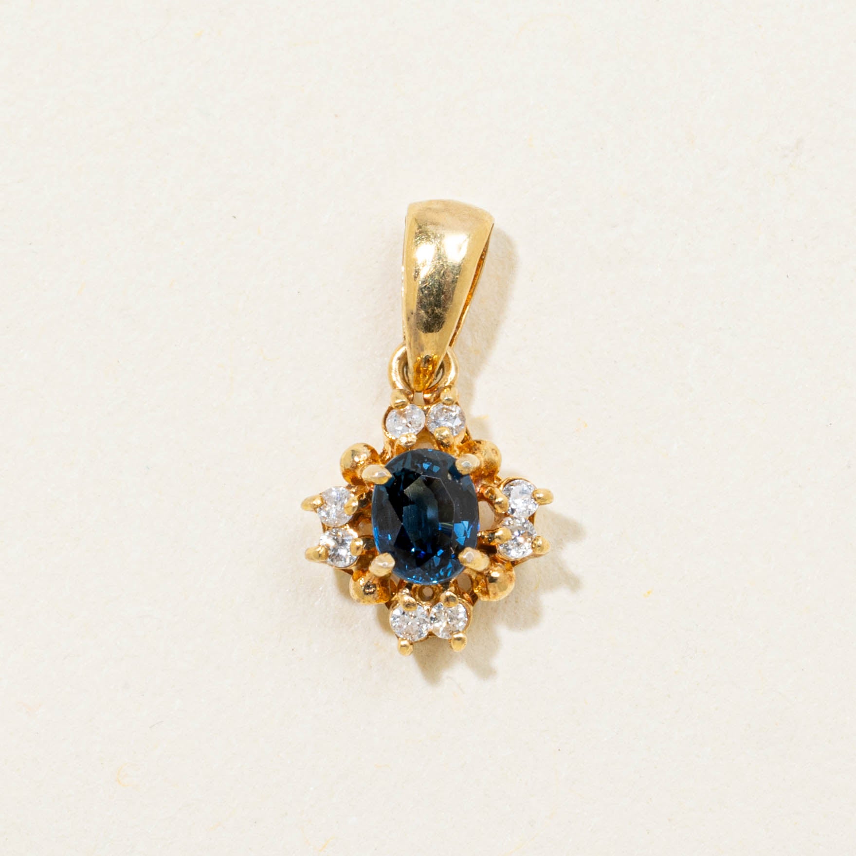 18k Sapphire & Diamond Petal Halo Pendant