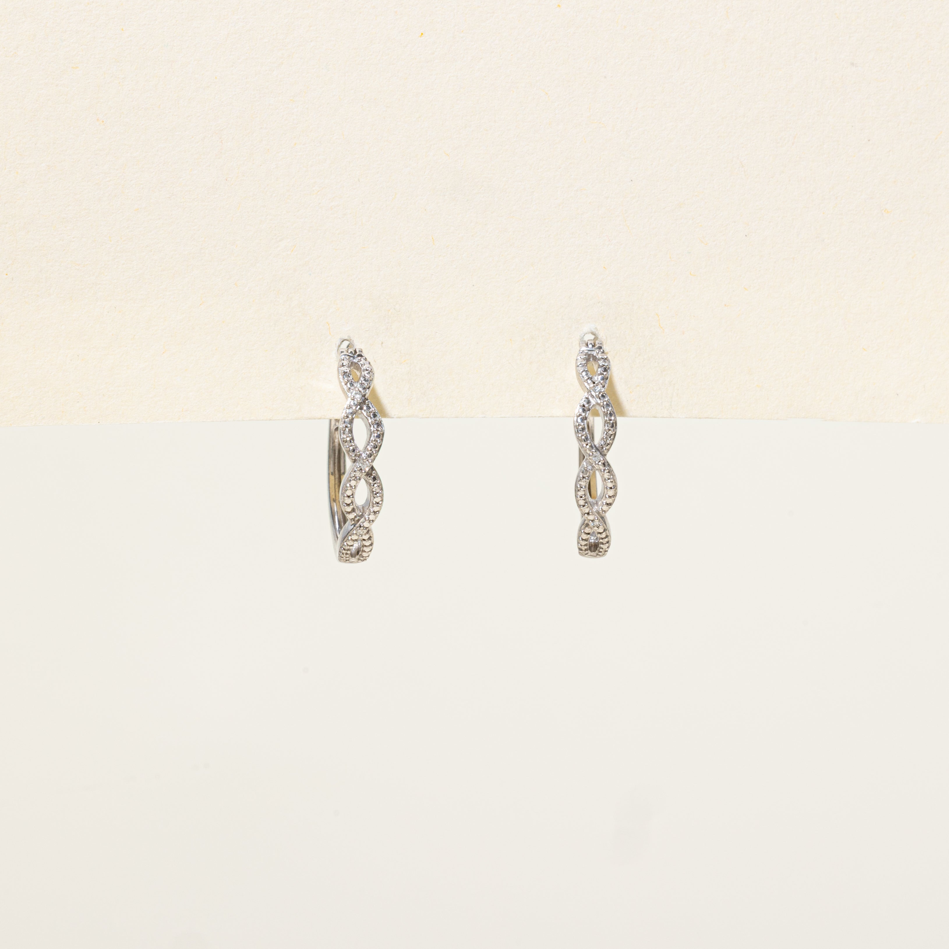 Sterling Silver Diamond Cross Over Hoop Earrings | 0.01ctw