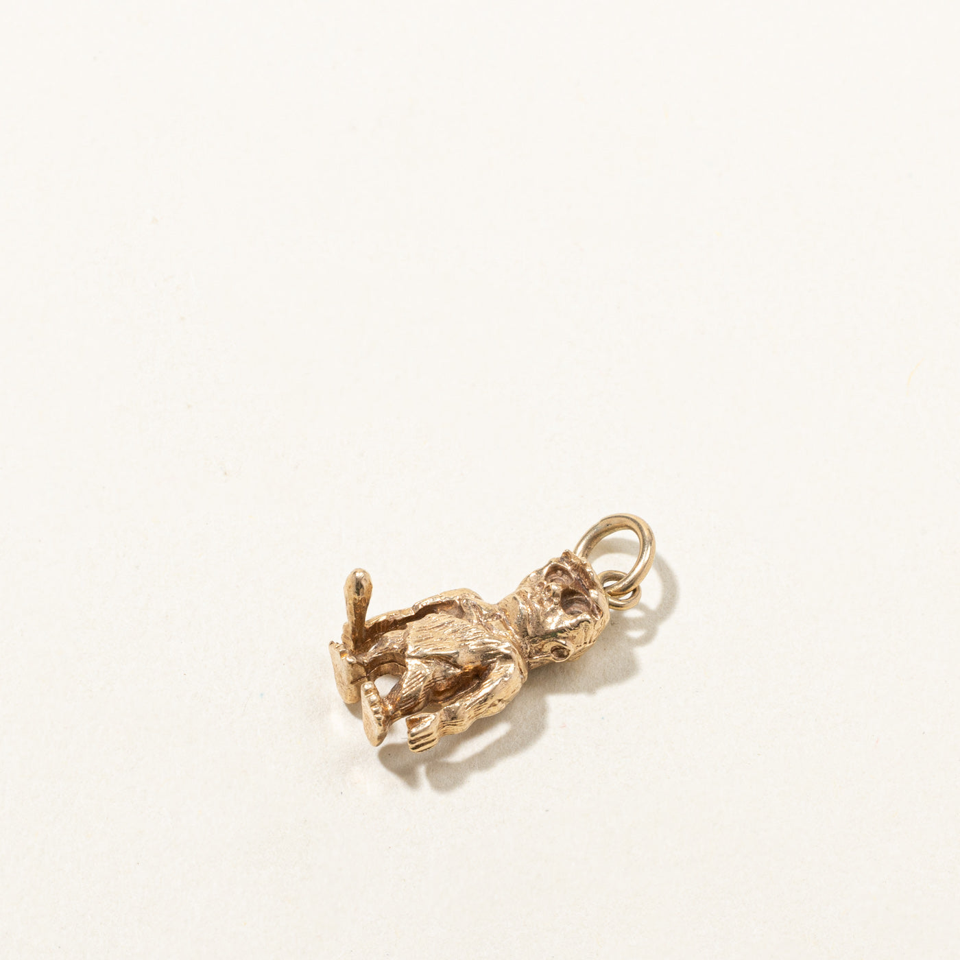 Gold Caveman Charm
