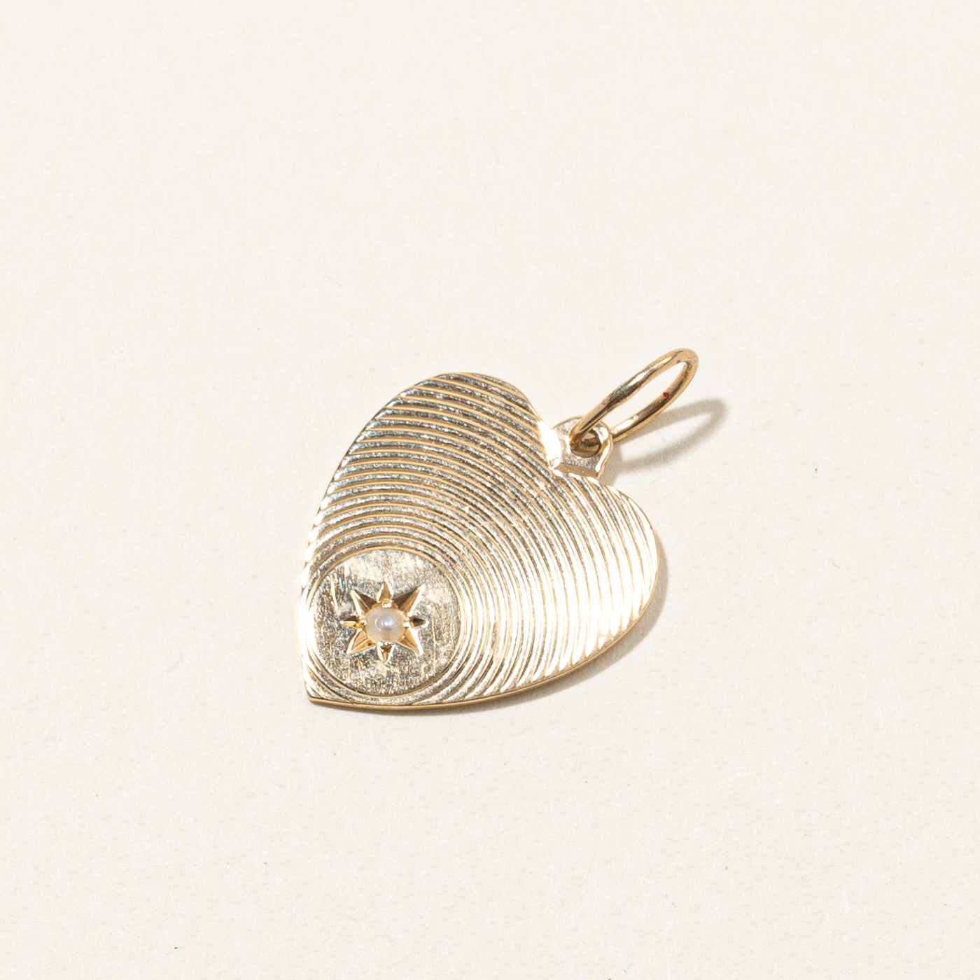 Pendentif cœur en perles fines