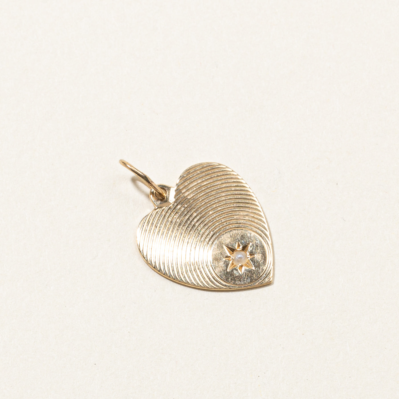 Pendentif cœur en perles fines