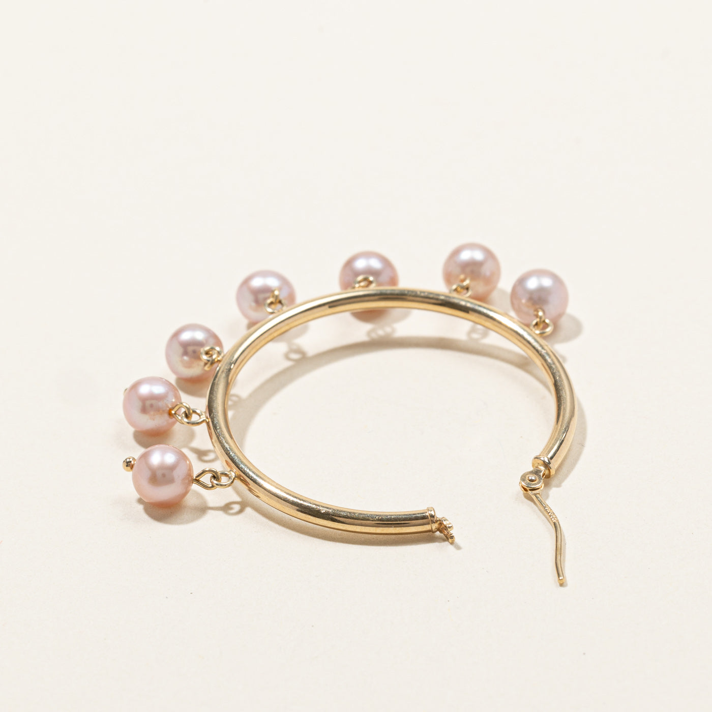 Boucles d'oreilles créoles en perles roses
