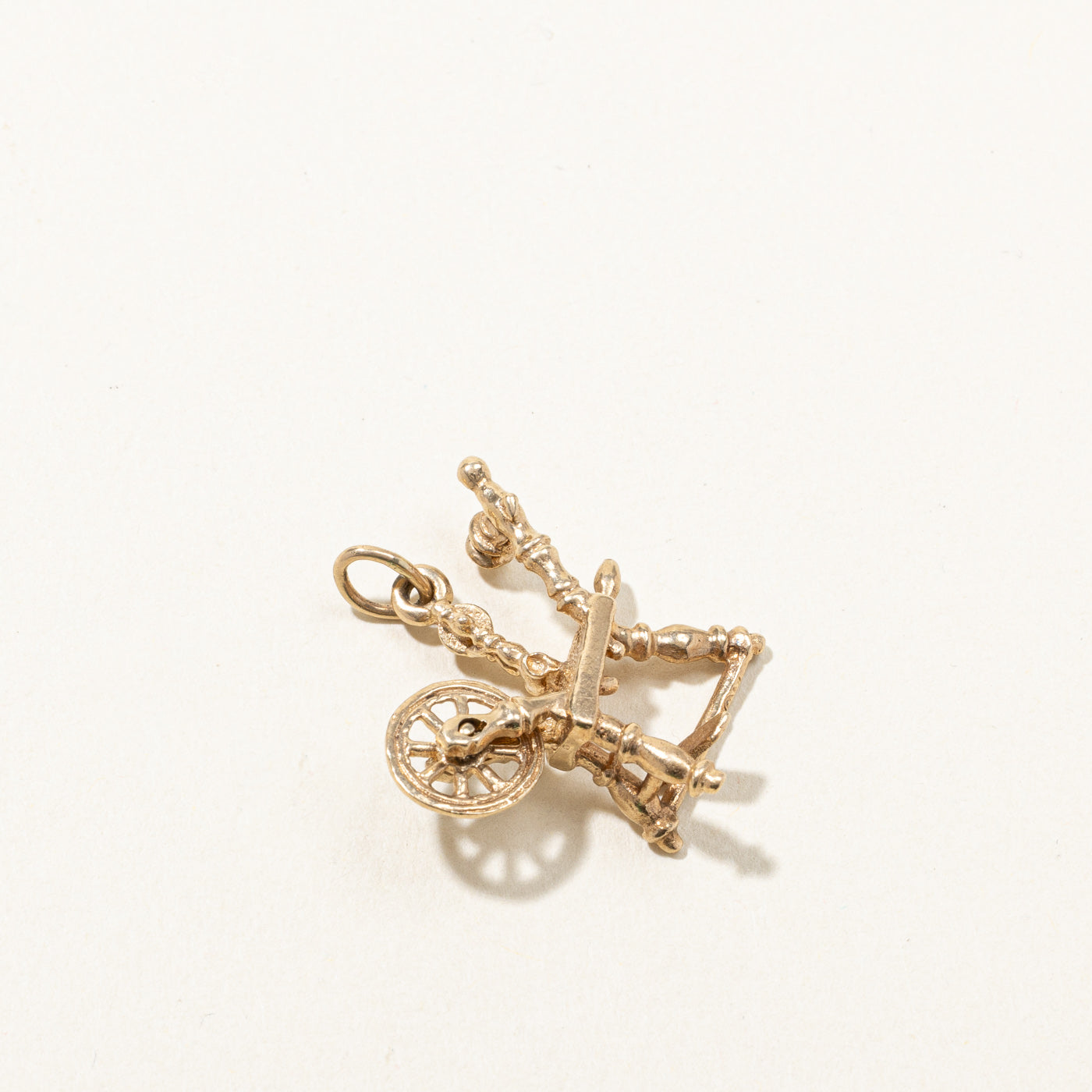 Gold Spinning Wheel Pendant
