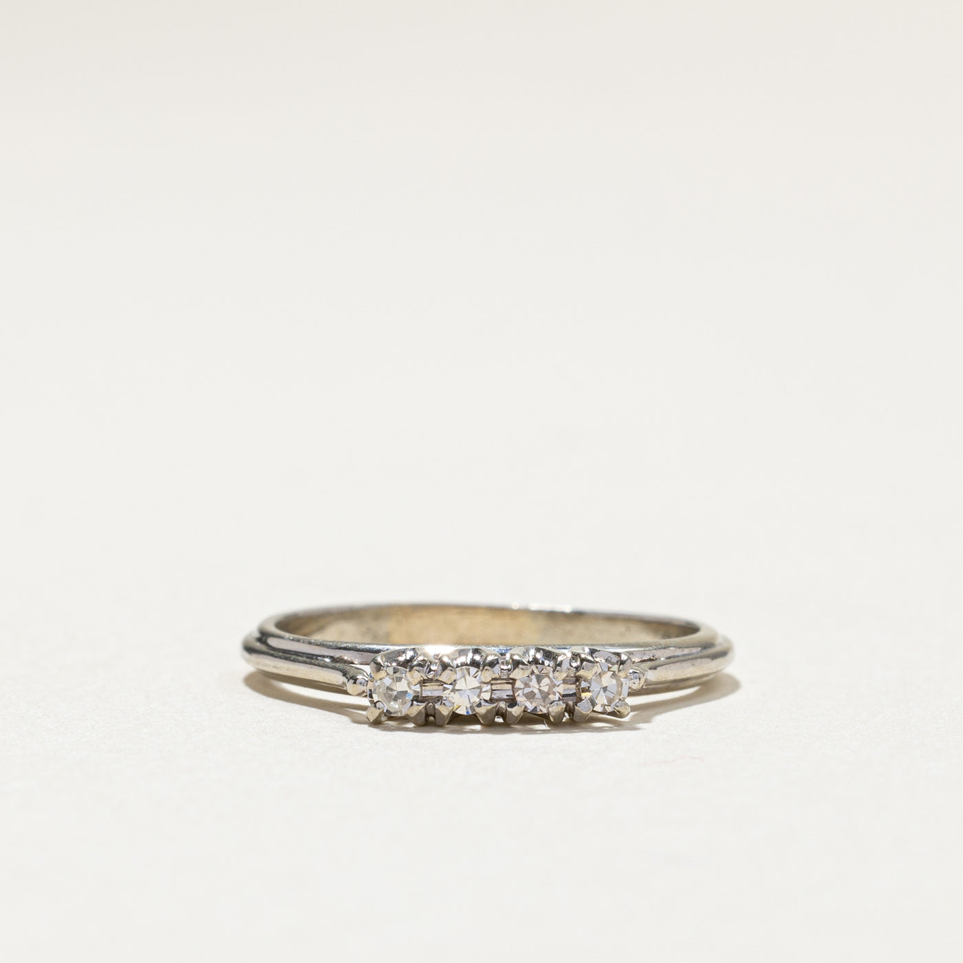 Four Stone Diamond Ring | 0.08ctw | SZ 6.25 |