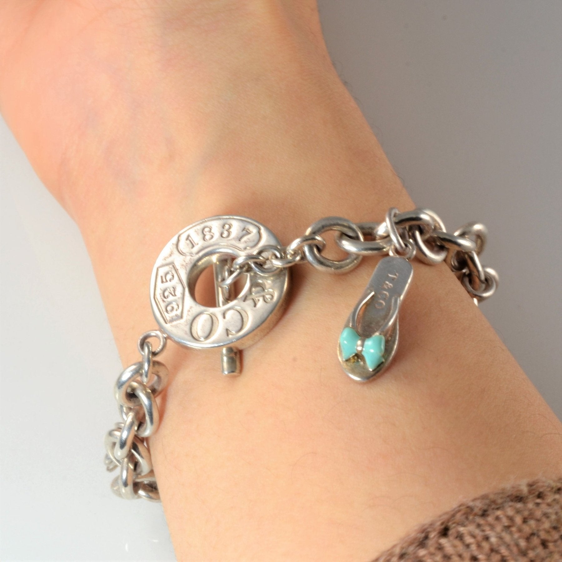 'Tiffany & Co.' Sterling Silver Charm Bracelet With Charms | 7.5" | - 100 Ways