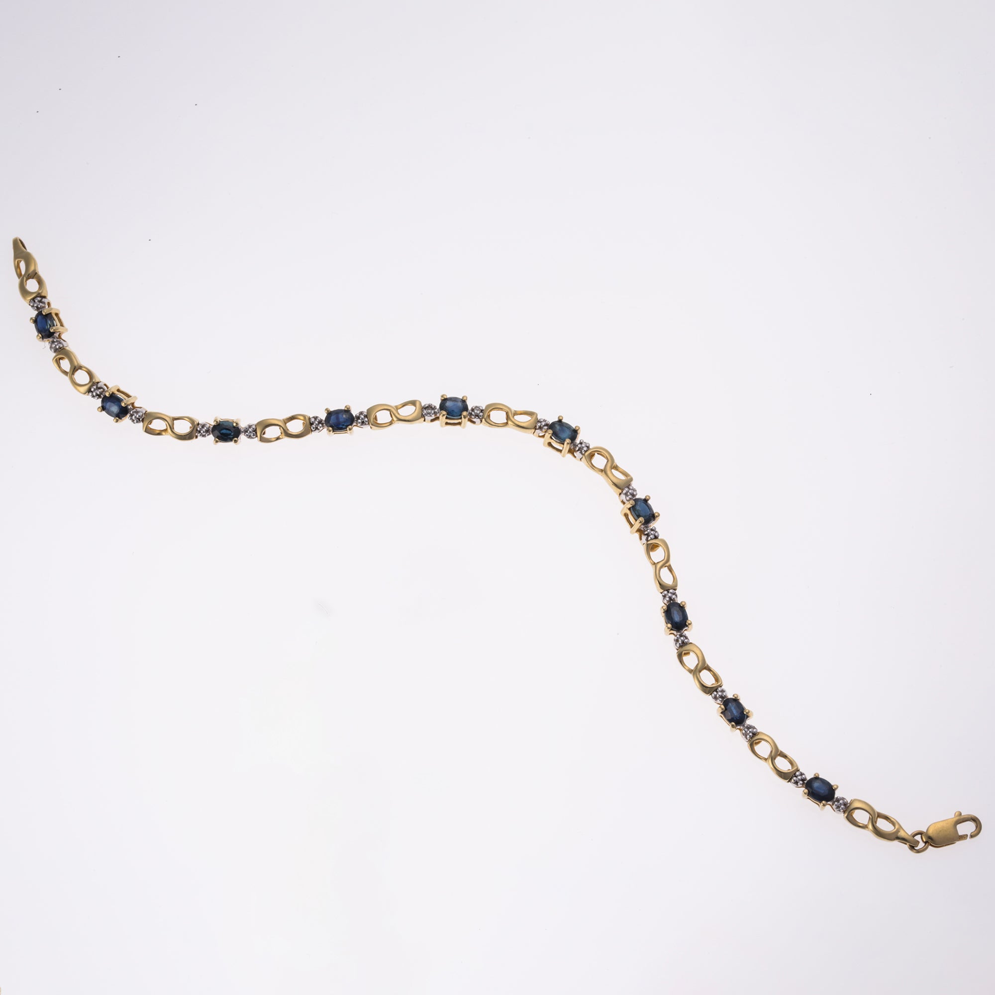 Bracelet en or jaune 14 carats, saphirs bleus et diamants | 2,60 ct au total, 0,01 ct au total | 17,8 cm |