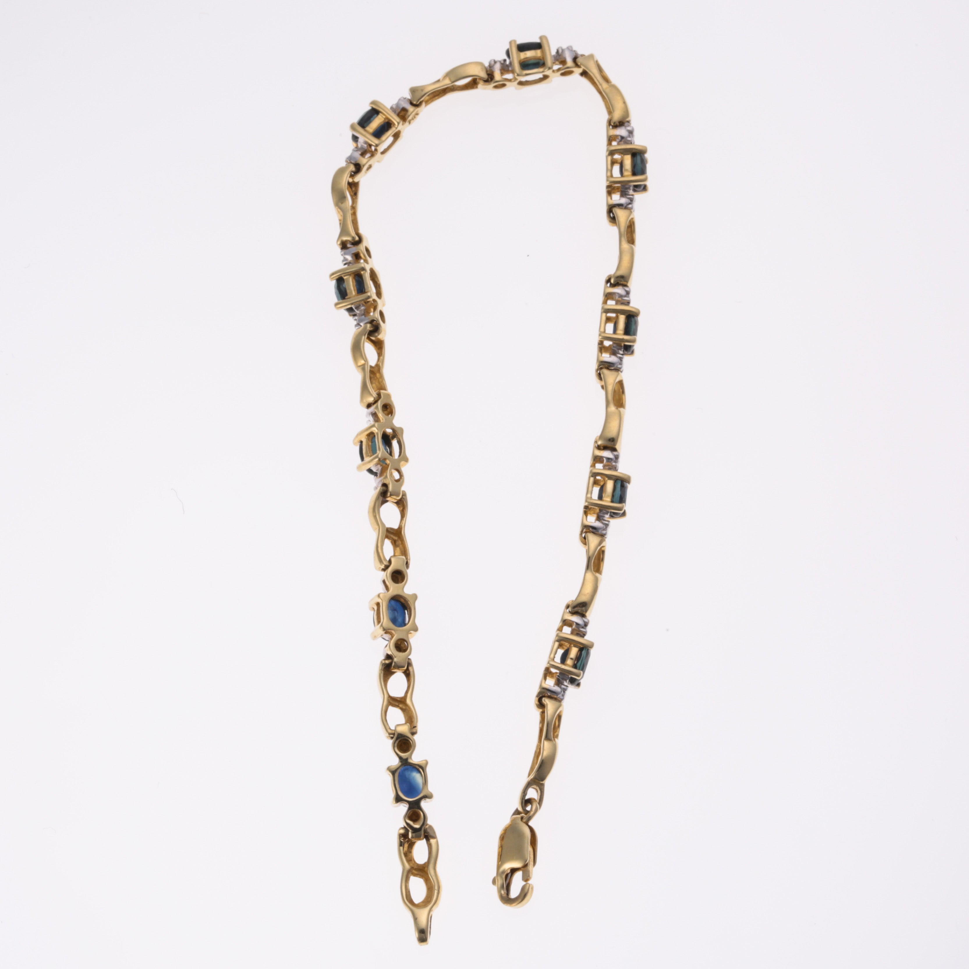 Bracelet en or jaune 14 carats, saphirs bleus et diamants | 2,60 ct au total, 0,01 ct au total | 17,8 cm |