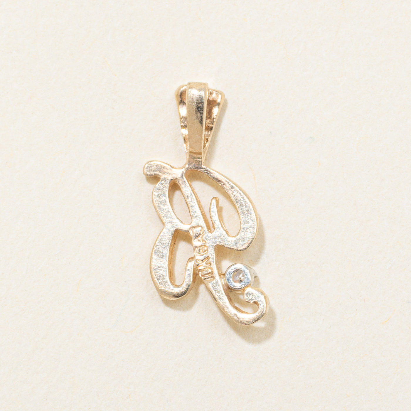 Pendentif initial « B » en or jaune 14 carats et diamants