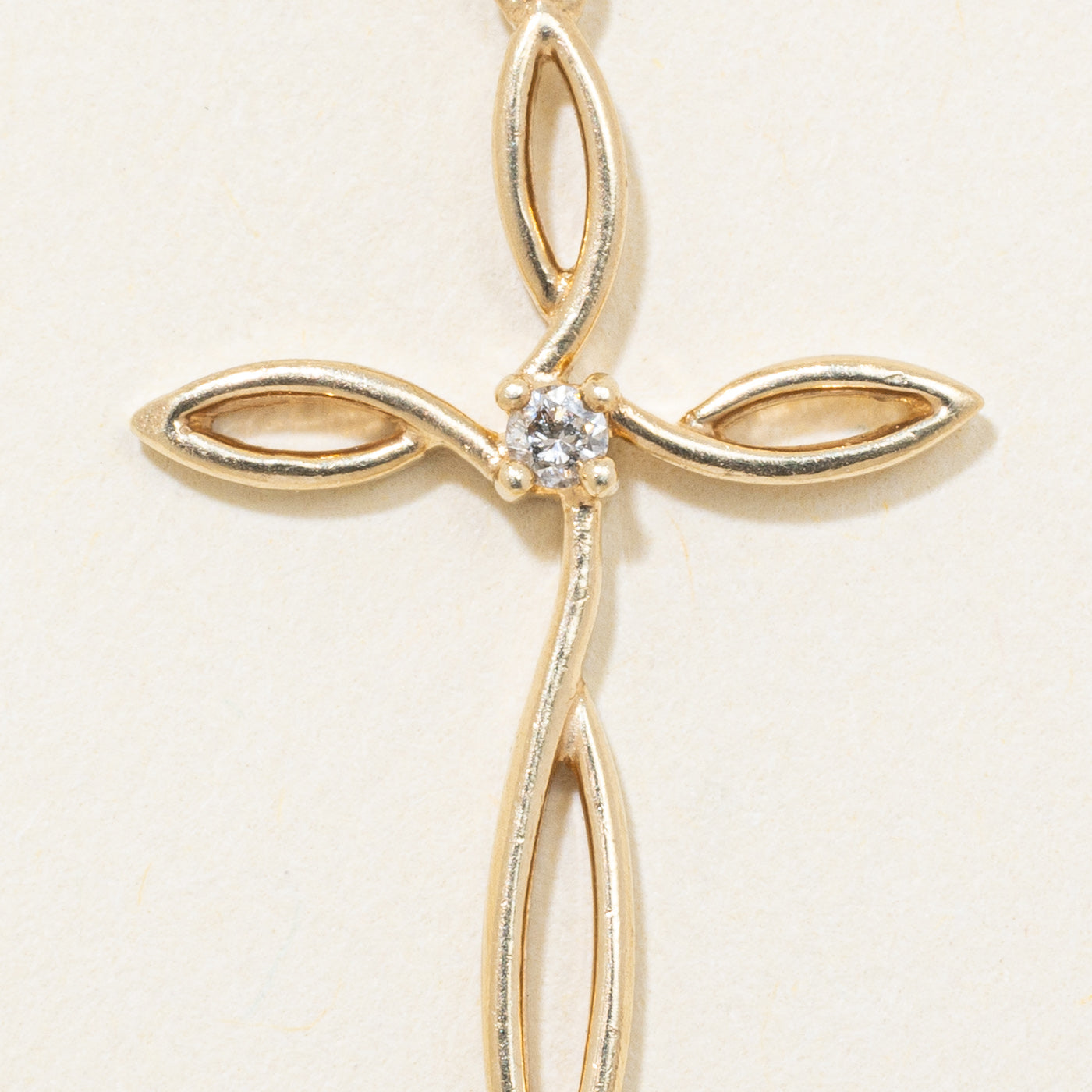 10k Yellow Gold Diamond Twisted Cross Pendant