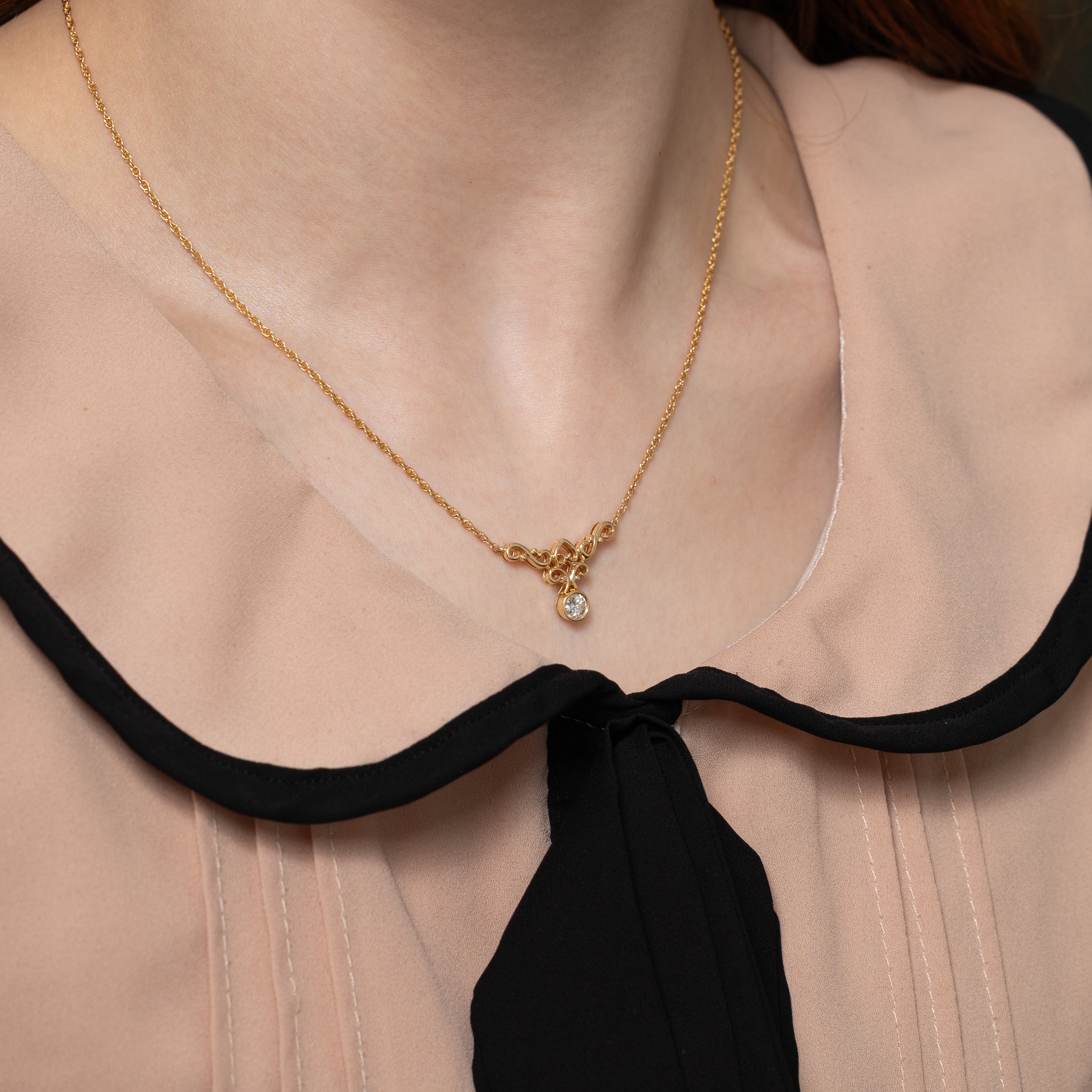 Yellow Gold Bezel Set Diamond Scrollwork Pendant Necklace | 0.26ct | 17"