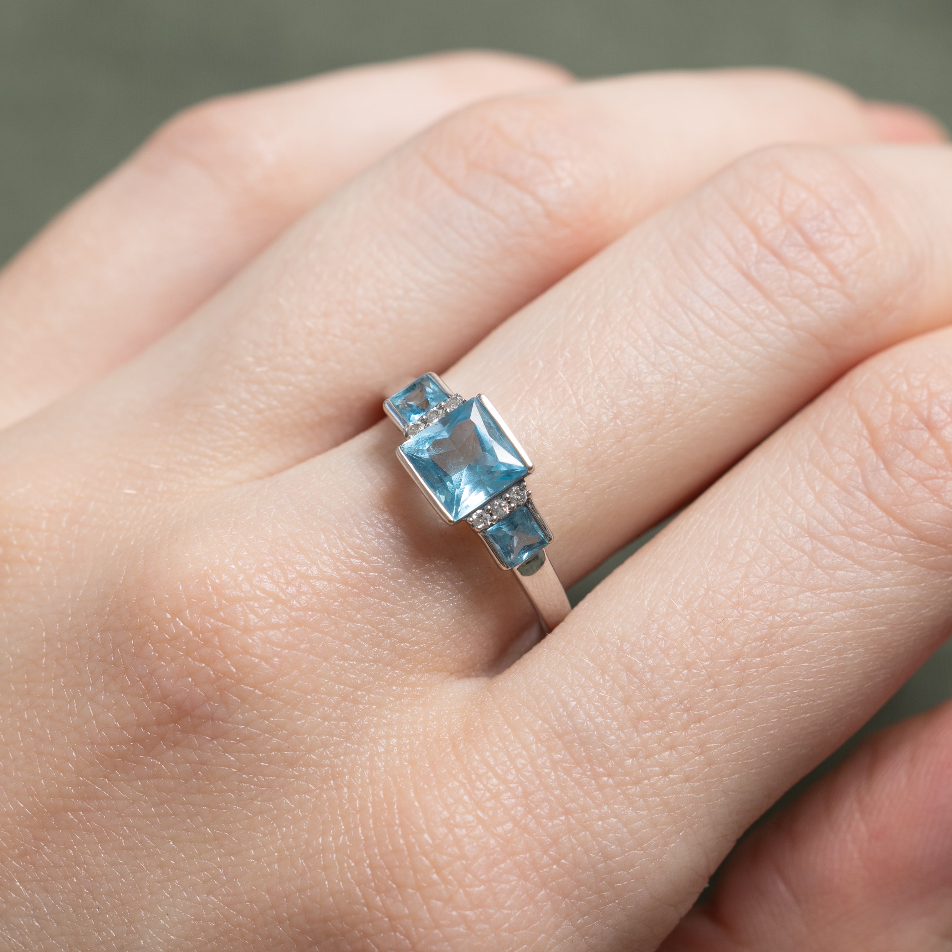 Radiant Cut Three Stone Topaz & Diamond Ring | 1.57ctw, 0.02ctw | SZ 7.75