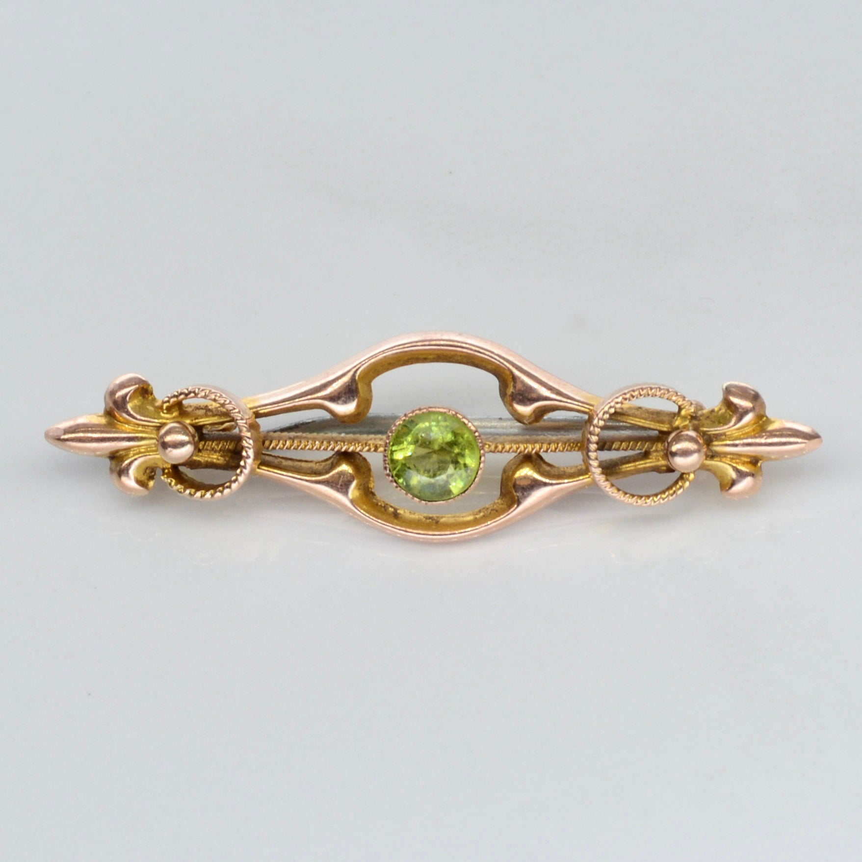 Gold brooch price sales