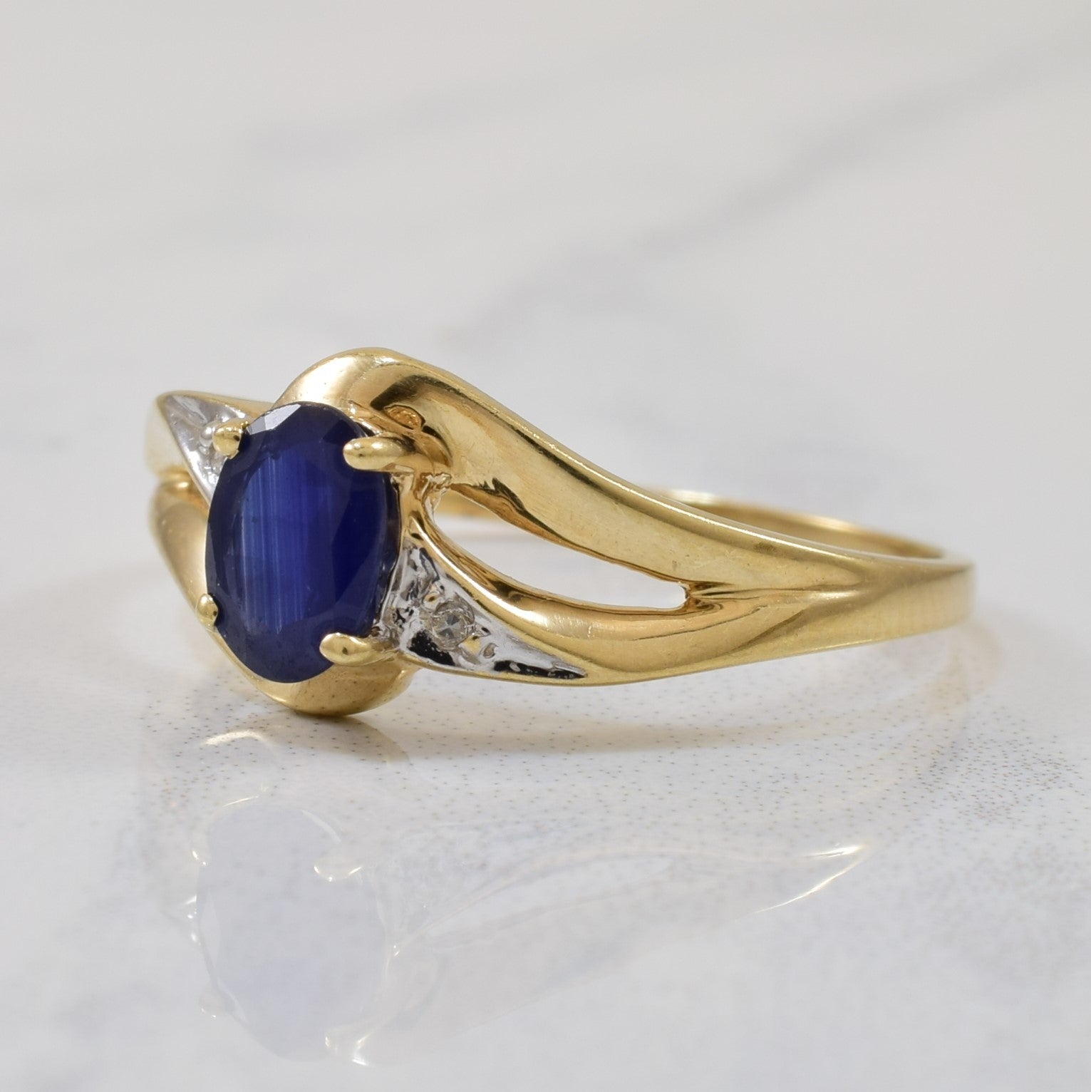 Sapphire & Diamond Split Shank Bypass Ring | 0.64ct, 0.01ctw | SZ 7 |