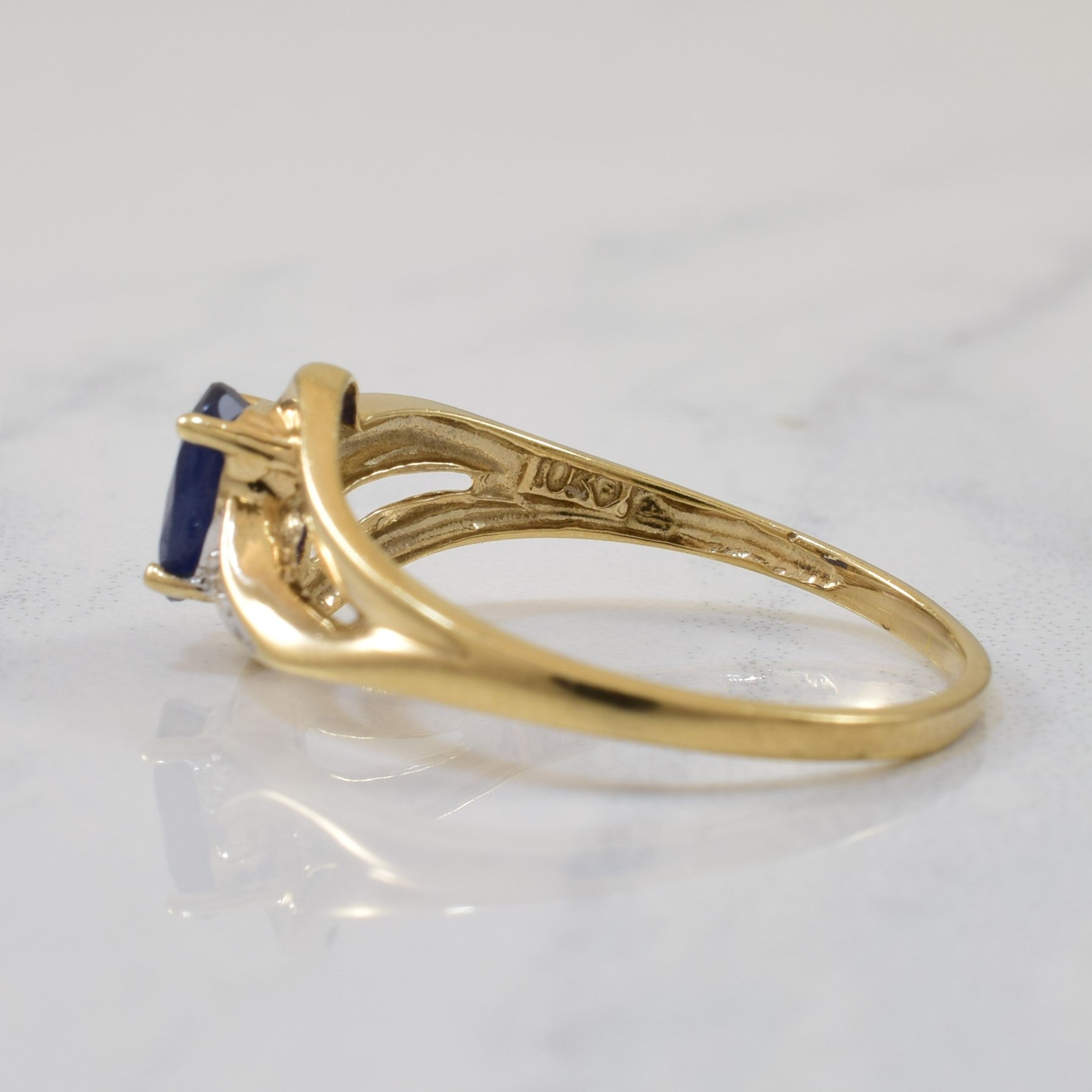 Sapphire & Diamond Split Shank Bypass Ring | 0.64ct, 0.01ctw | SZ 7 |
