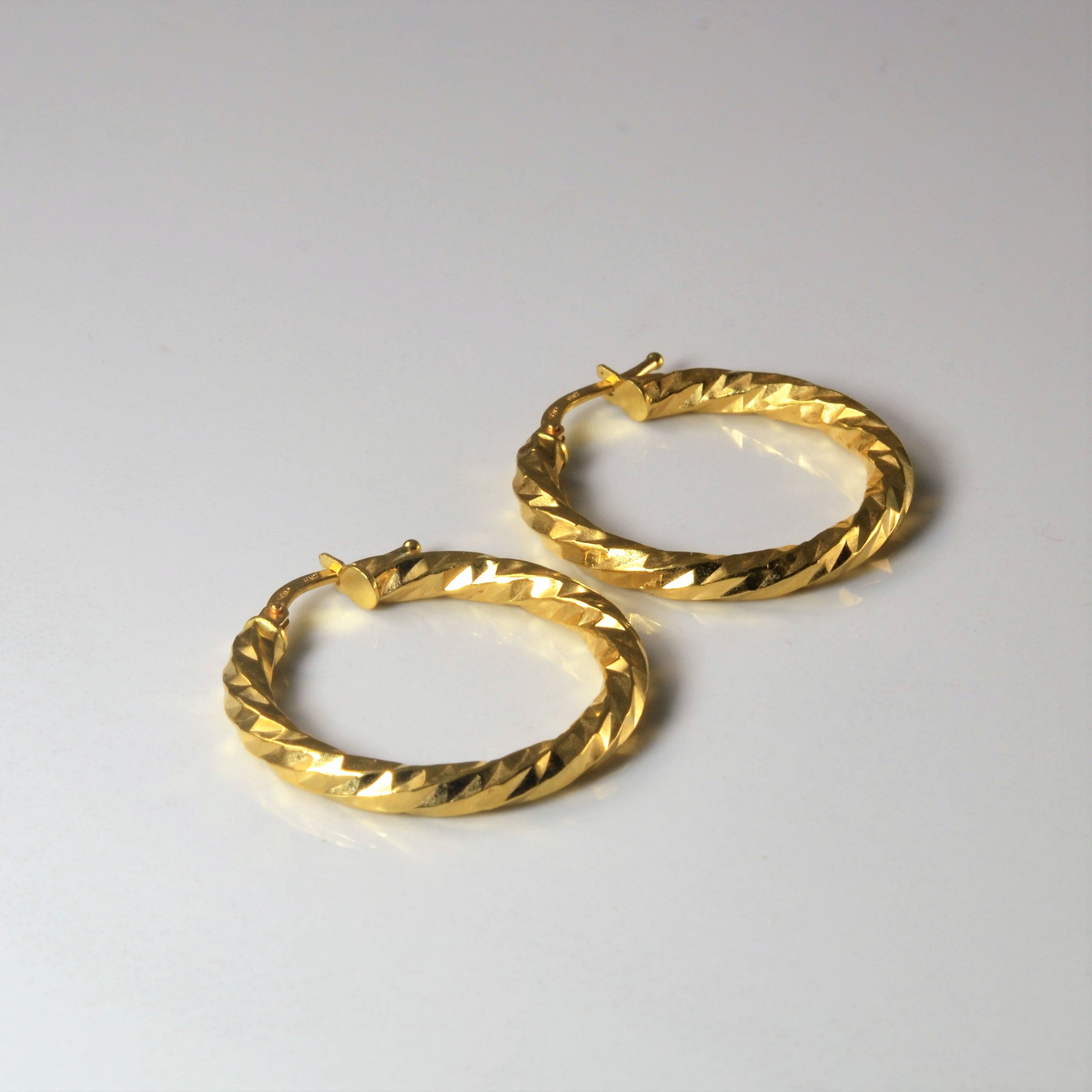 Twisted Yellow Gold Hoop Earrings |