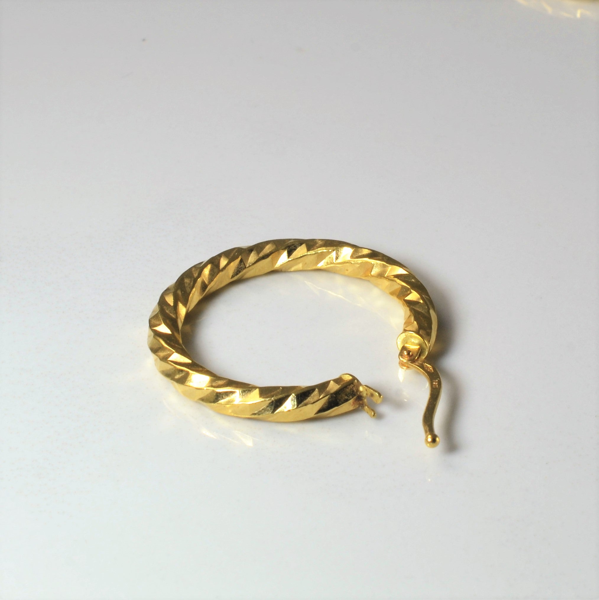 Twisted Yellow Gold Hoop Earrings |