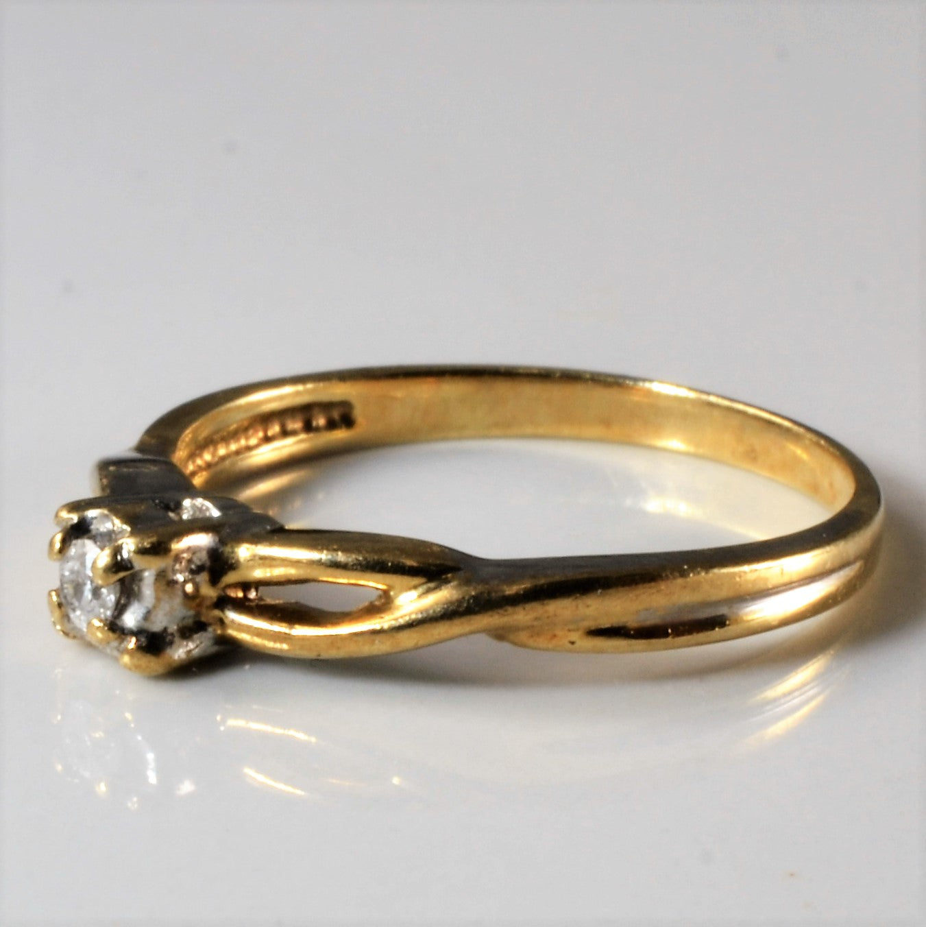 Crossover Solitaire Diamond Ring | 0.04ct | SZ 7 |