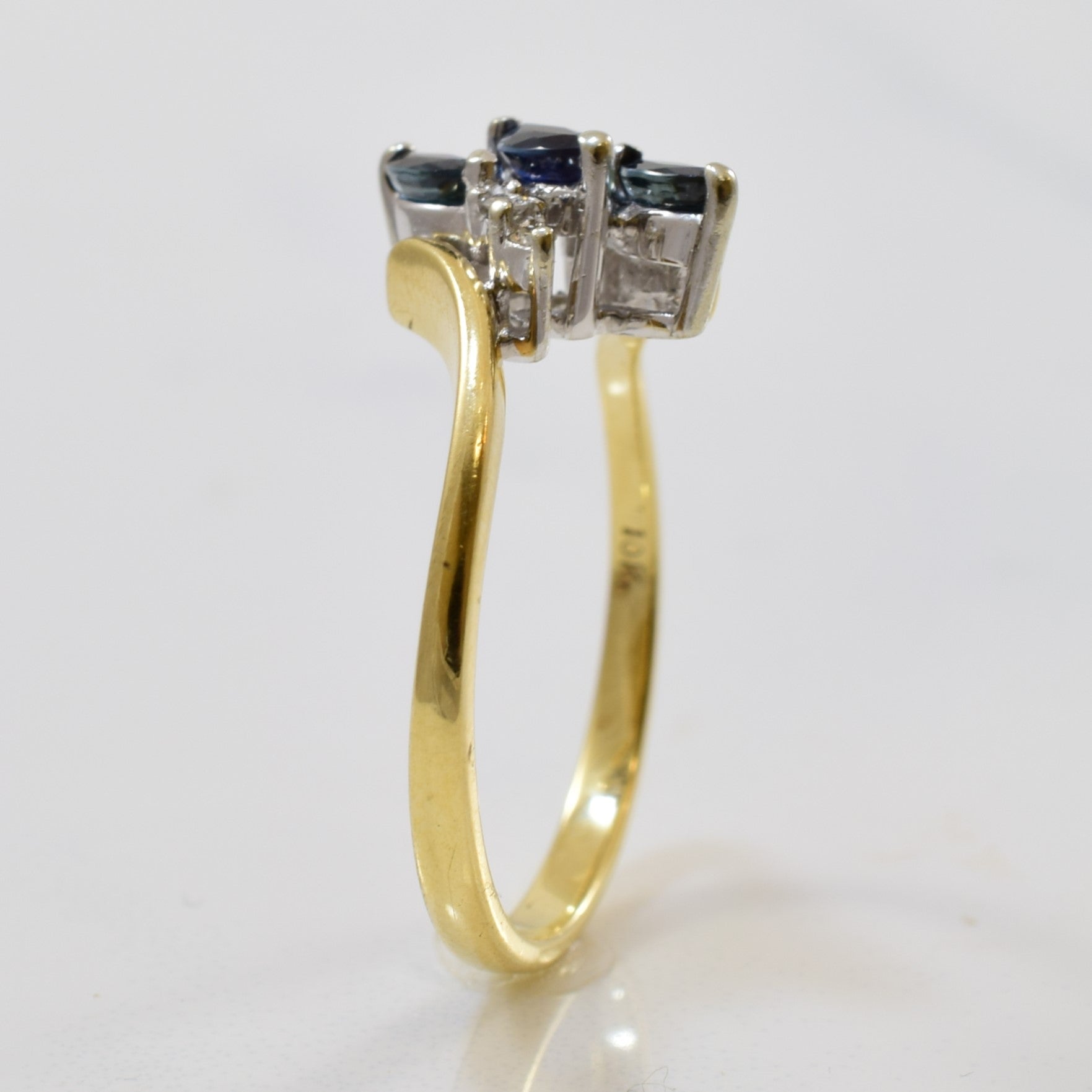 Blue Sapphire & Diamond Bypass Ring | 0.25ctw, 0.04ctw | SZ 6.5 |