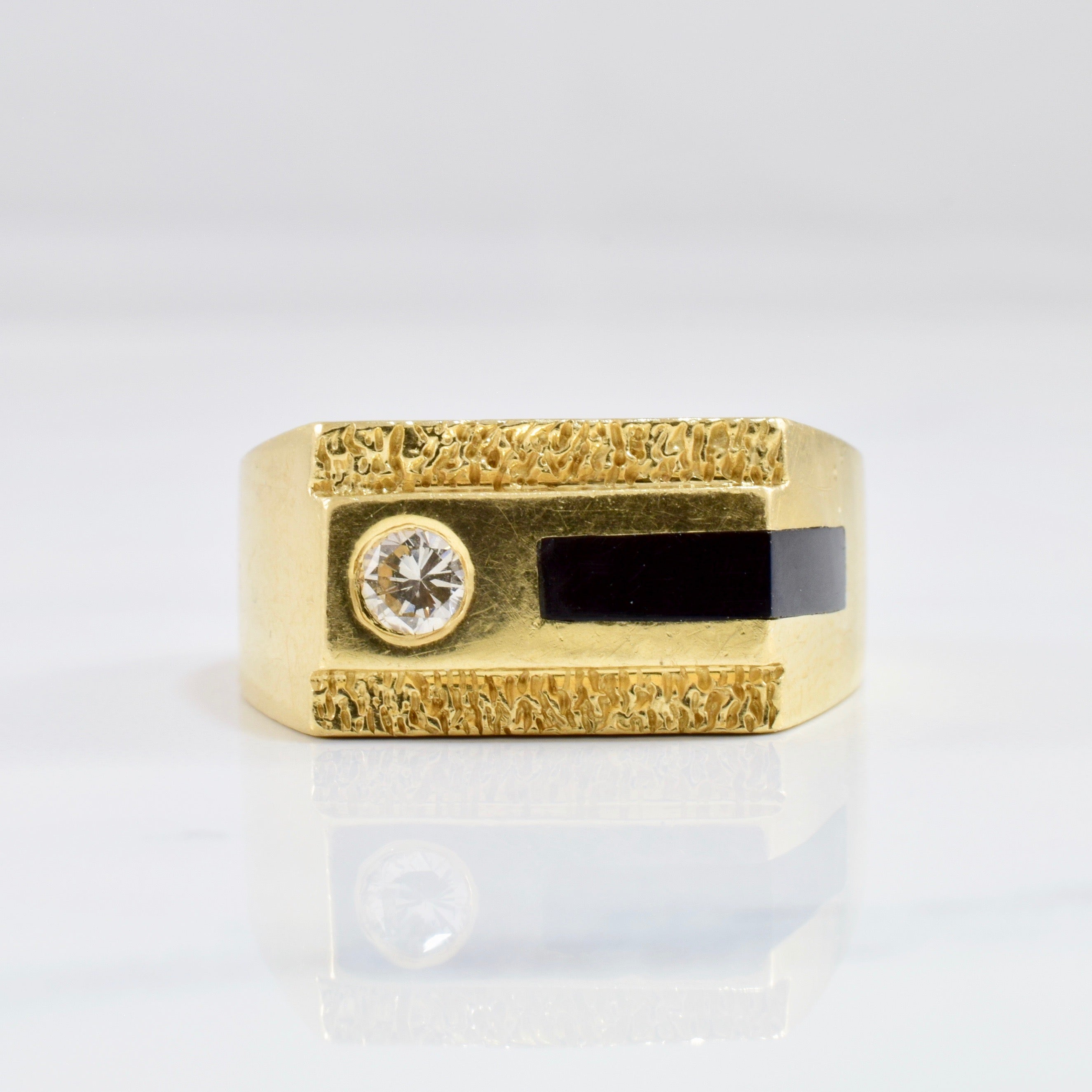 Bague en onyx et diamants | 0,18 ct Taille 9,75 |