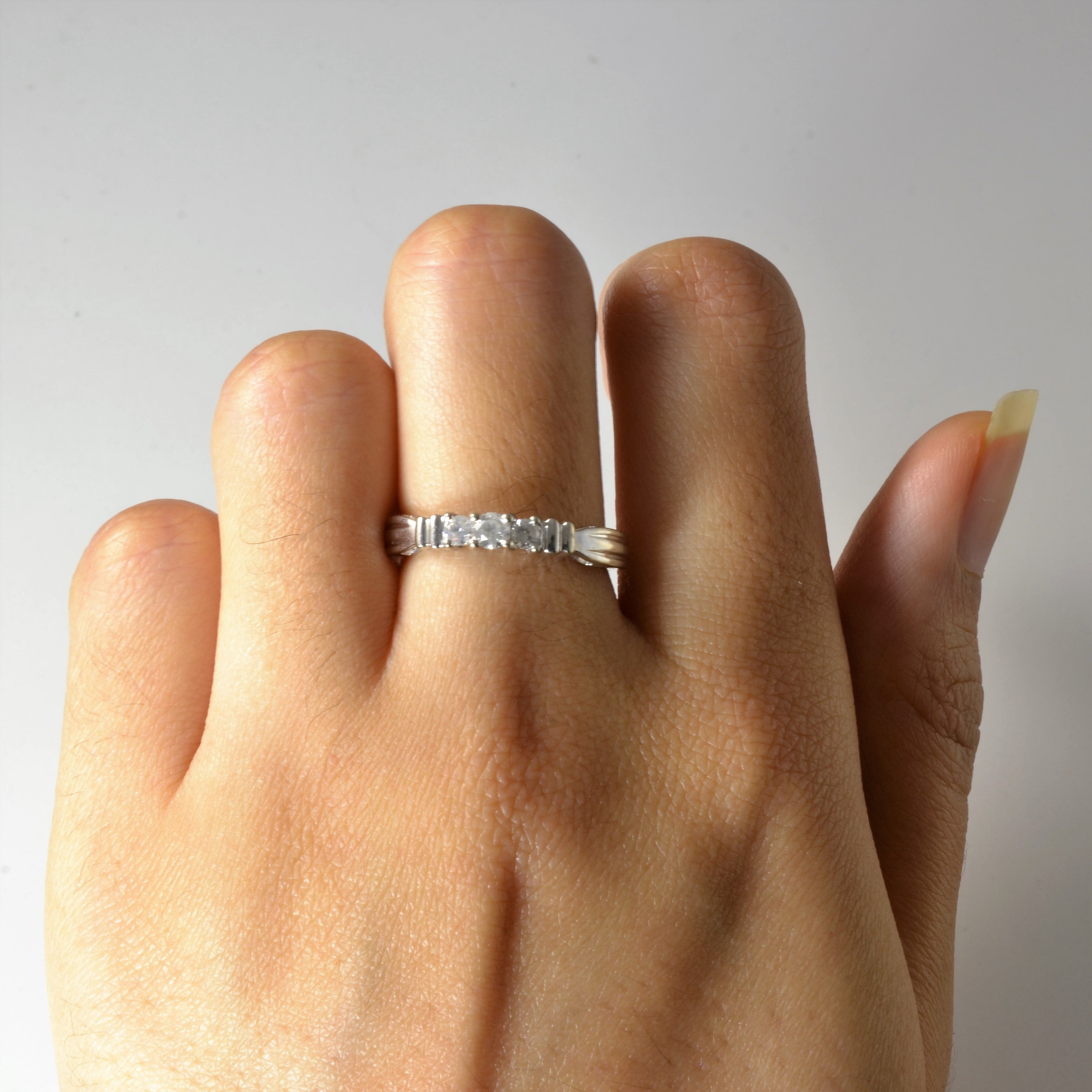Three Stone Diamond Ring | 0.22ctw | SZ 7 |