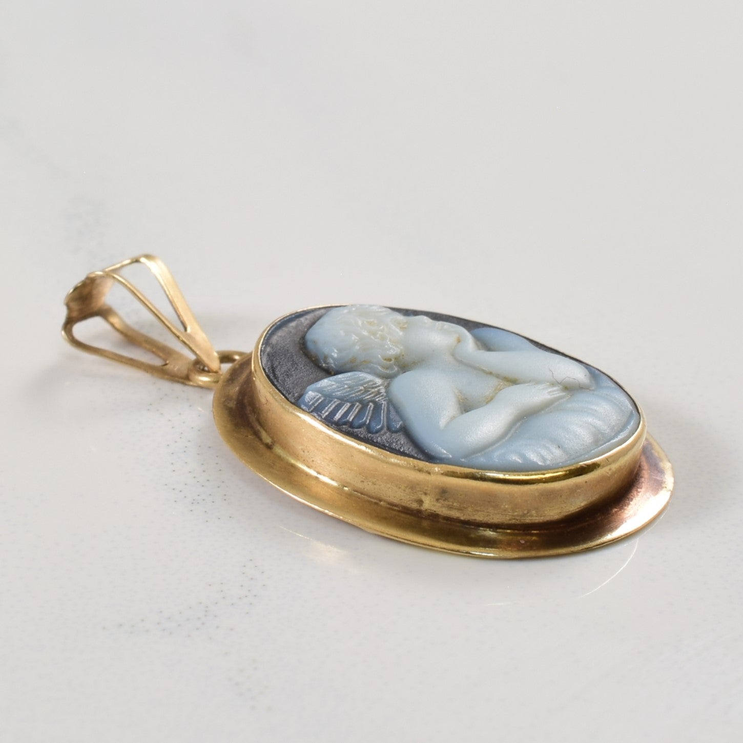 Pendentif camée chérubin en onyx | 4,50 ct |