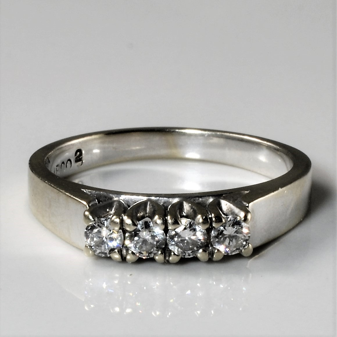 Four Stone Diamond Ring | 0.22ctw | SZ 5.75 |