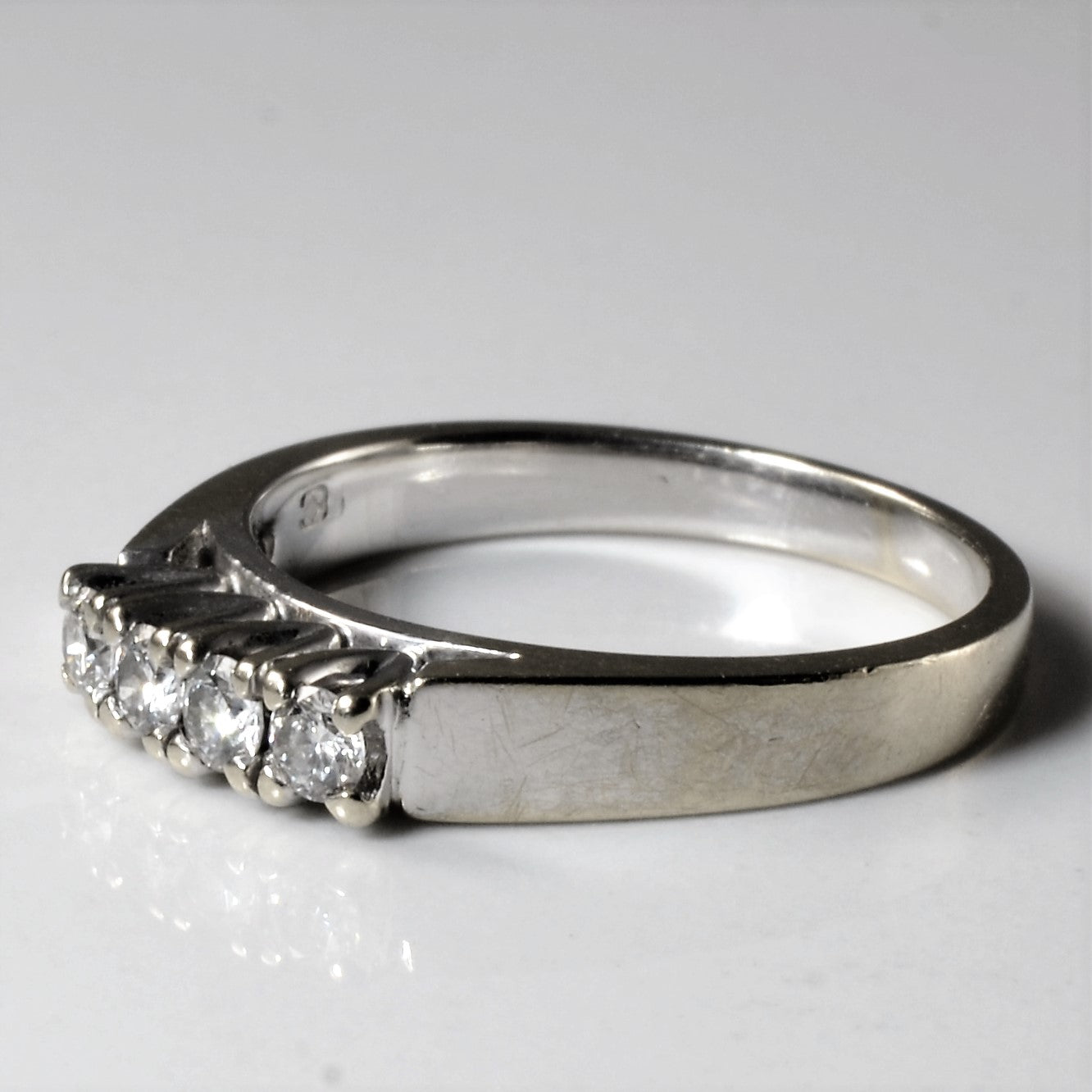 Four Stone Diamond Ring | 0.22ctw | SZ 5.75 |