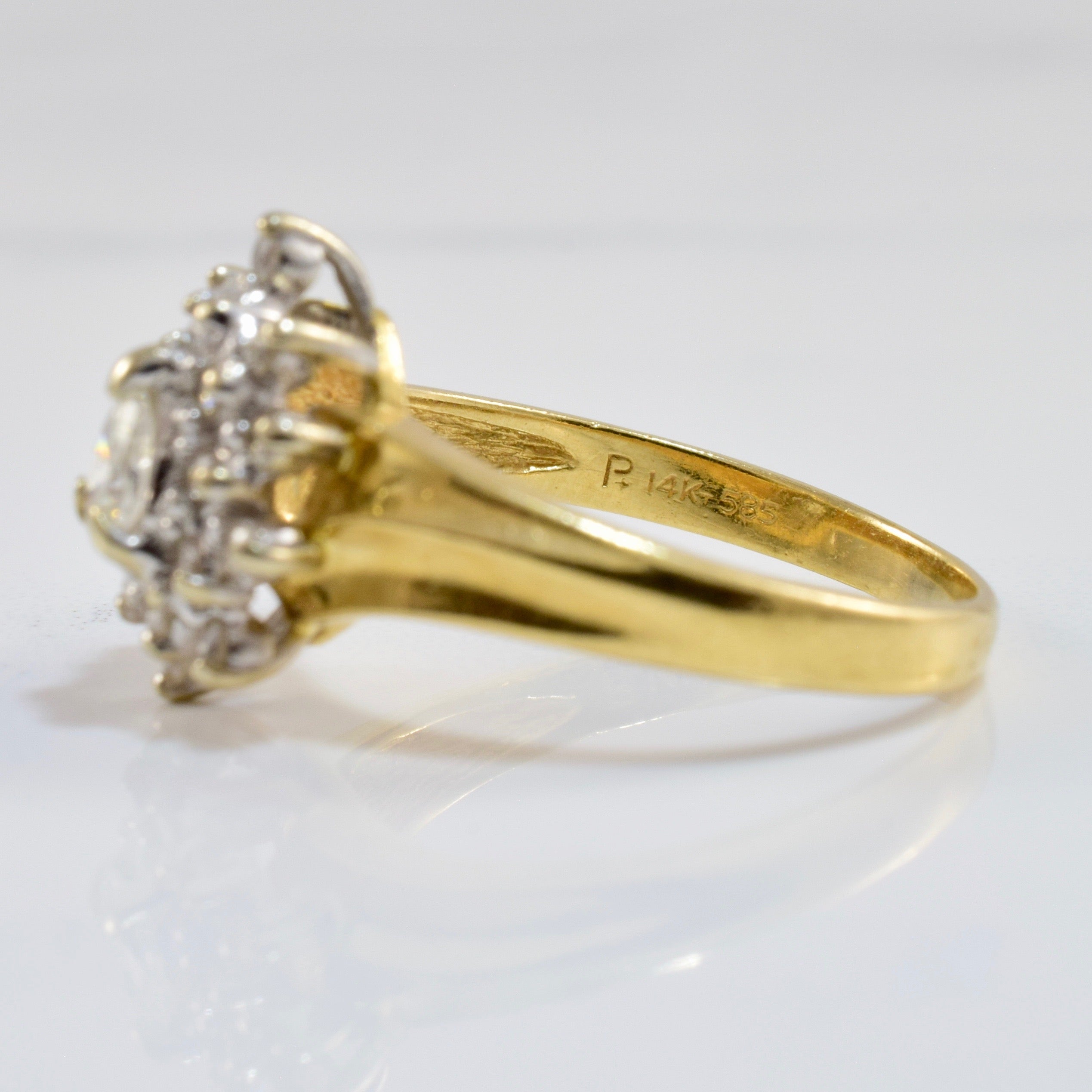 Pear Cut Diamond Ring with Diamond Halo | 0.32 ctw SZ 5.75 |