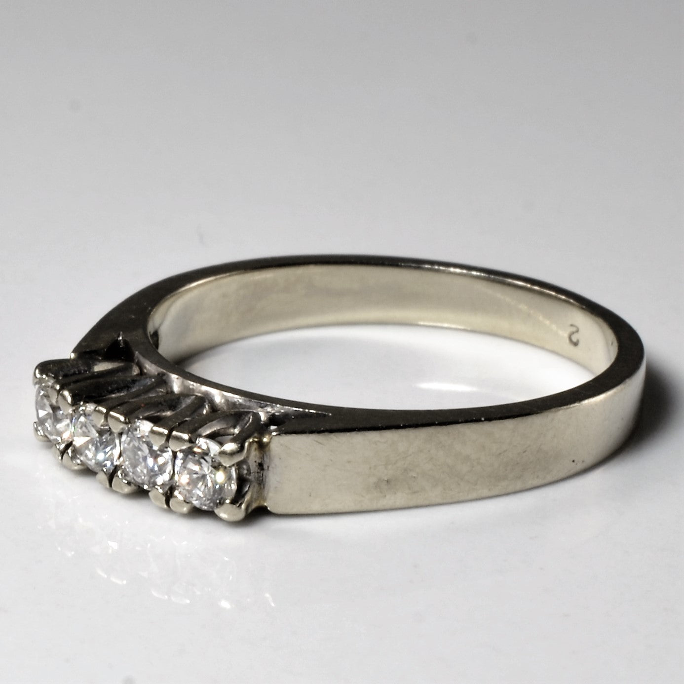 Four Stone Diamond Ring | 0.20ctw | SZ 5.75 |