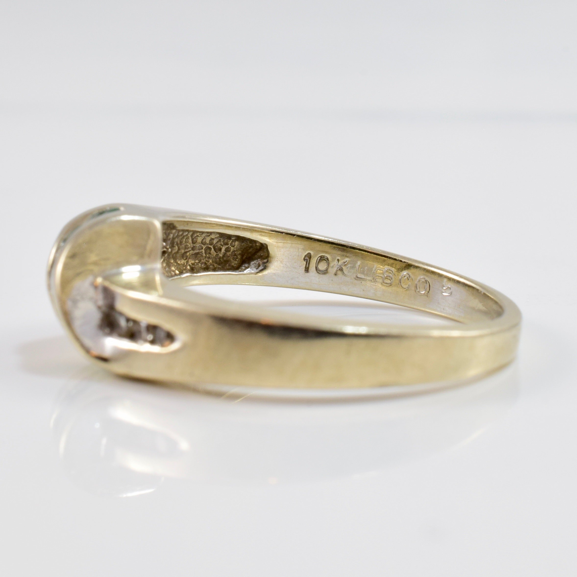 Bague contournante émeraude et diamant | 0,05 ct au total, taille 5,5 |