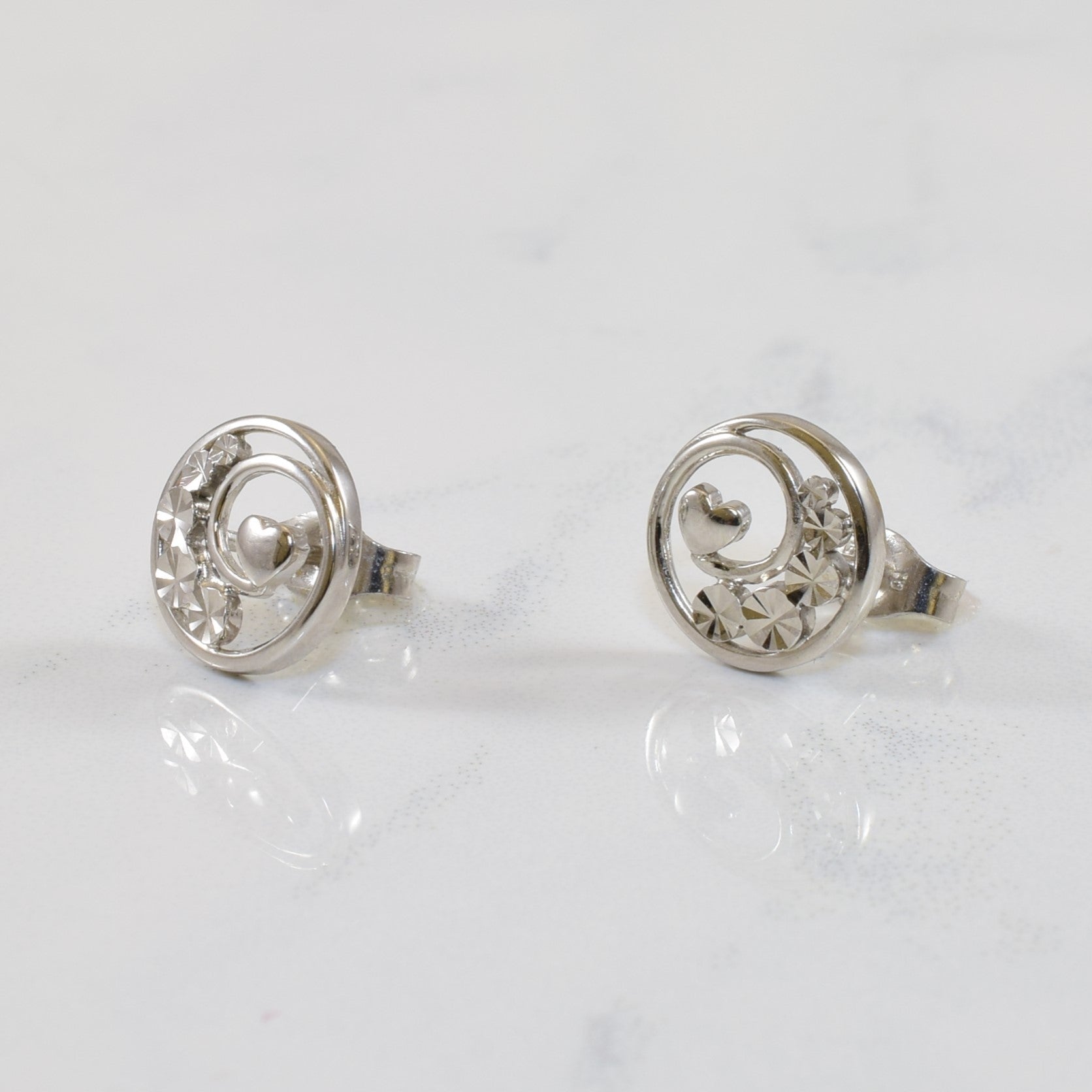 Illusion Cut Heart Swirl Earrings |