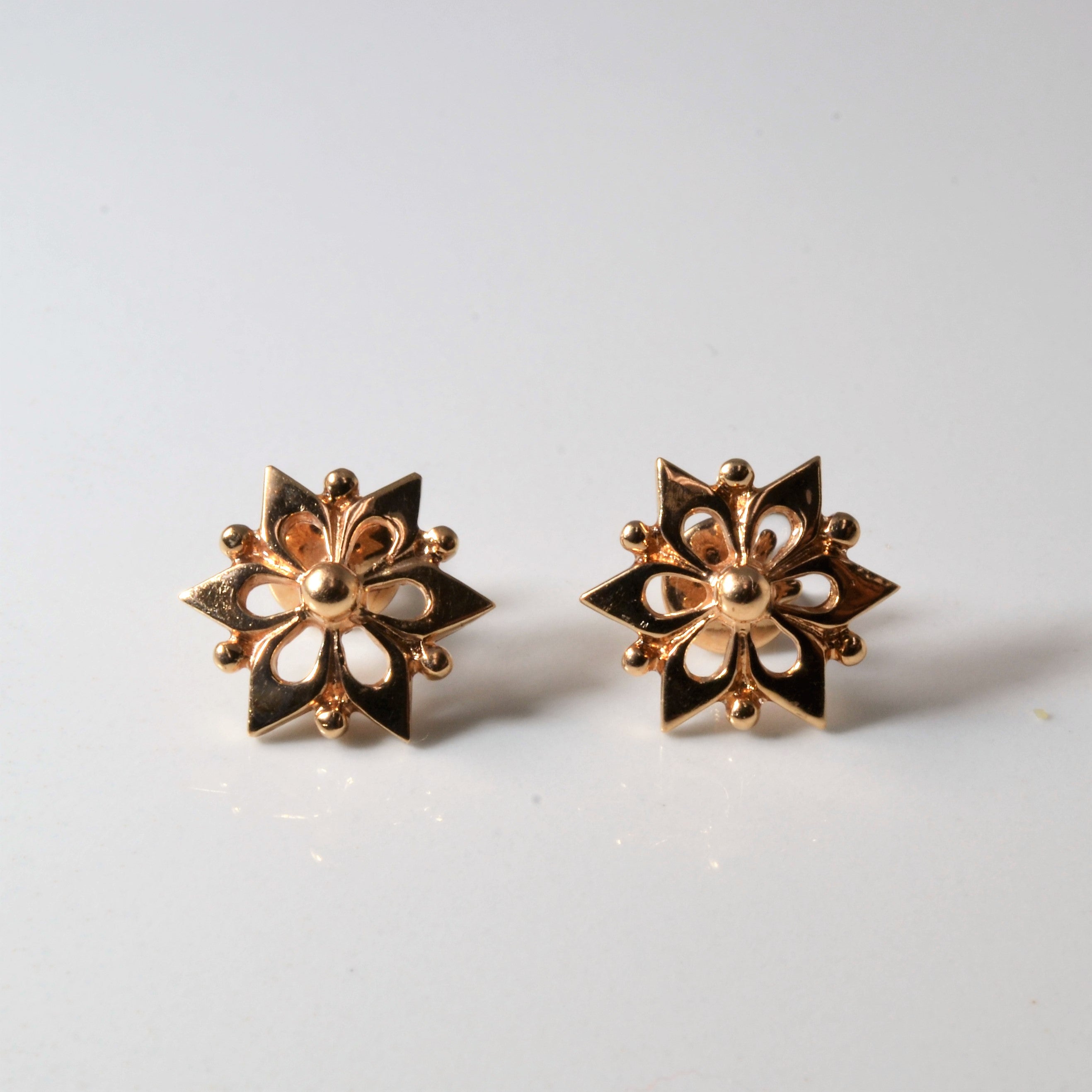 Floral Design Gold Stud Earrings