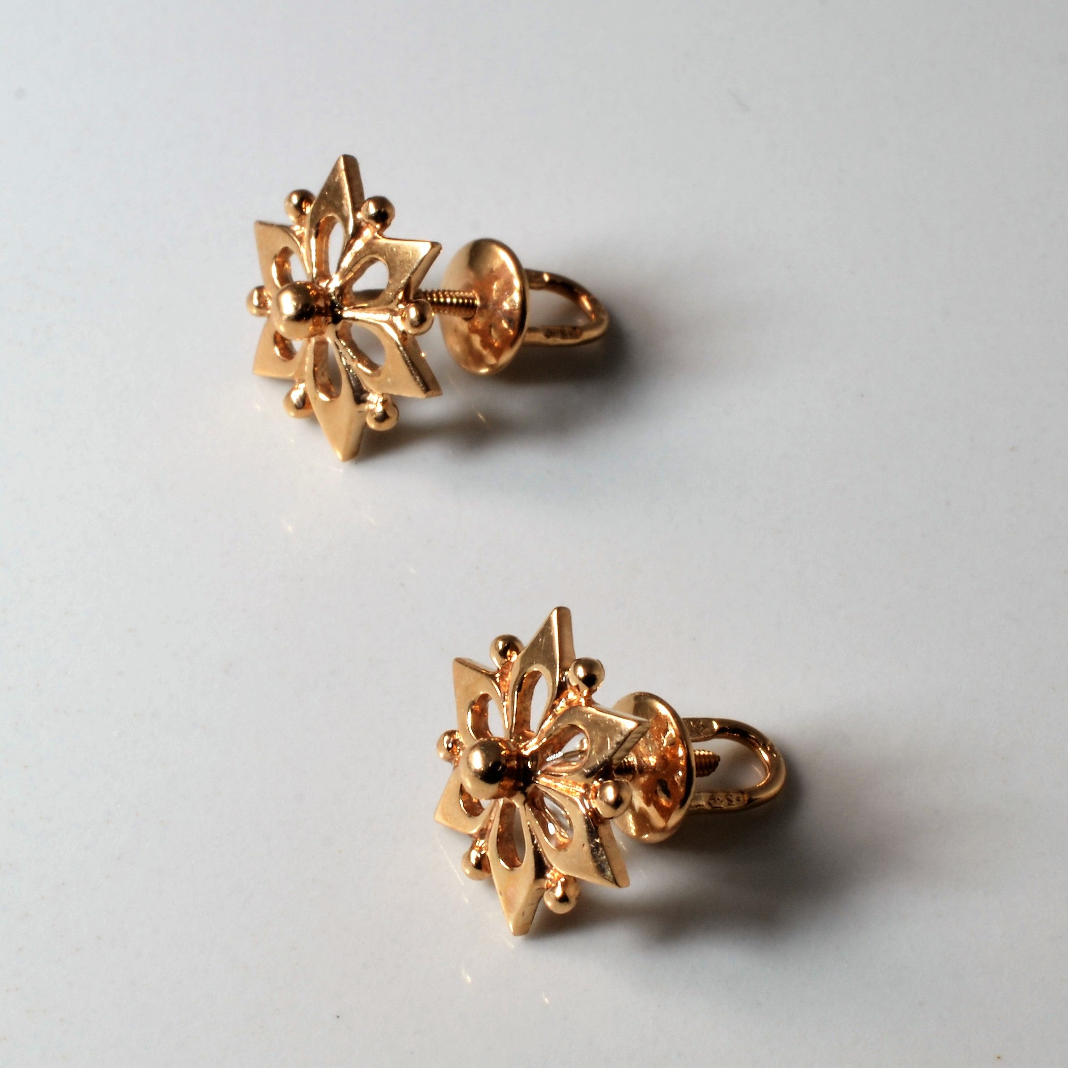 Floral Design Gold Stud Earrings