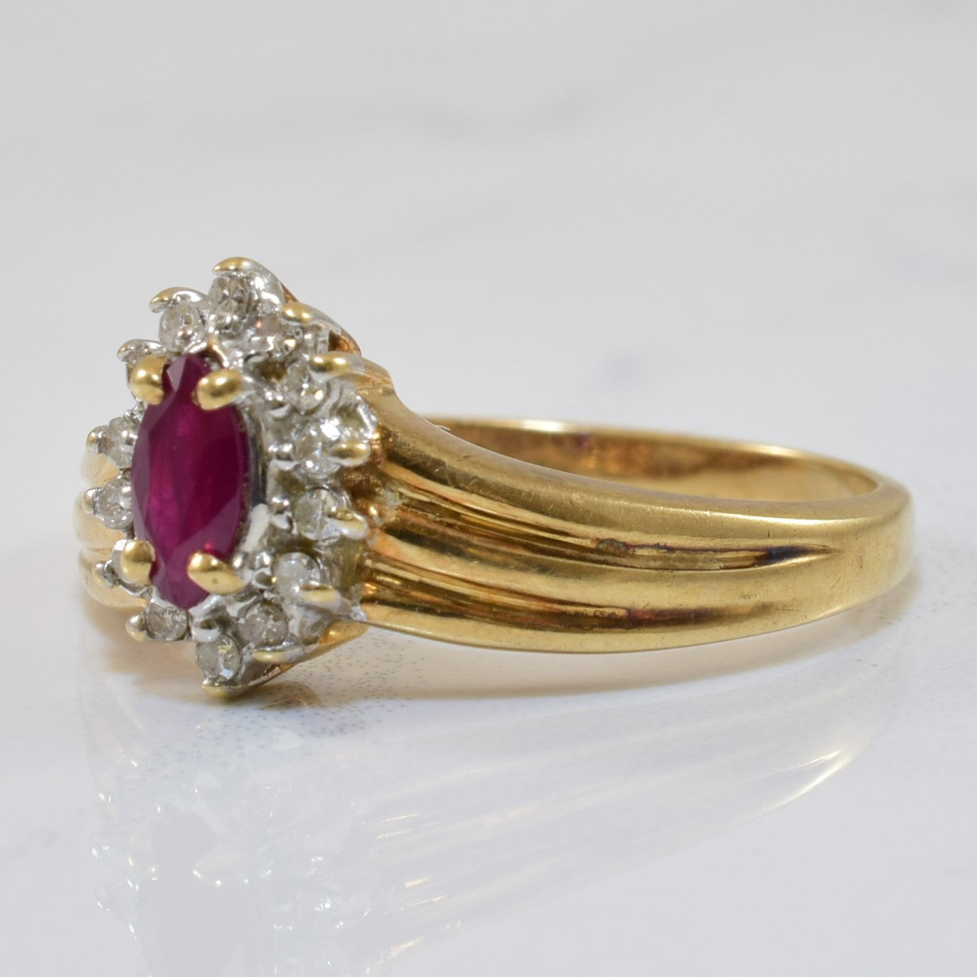 Marquise Ruby & Diamond Halo Ring | 0.25ct, 0.07ctw | SZ 8 |