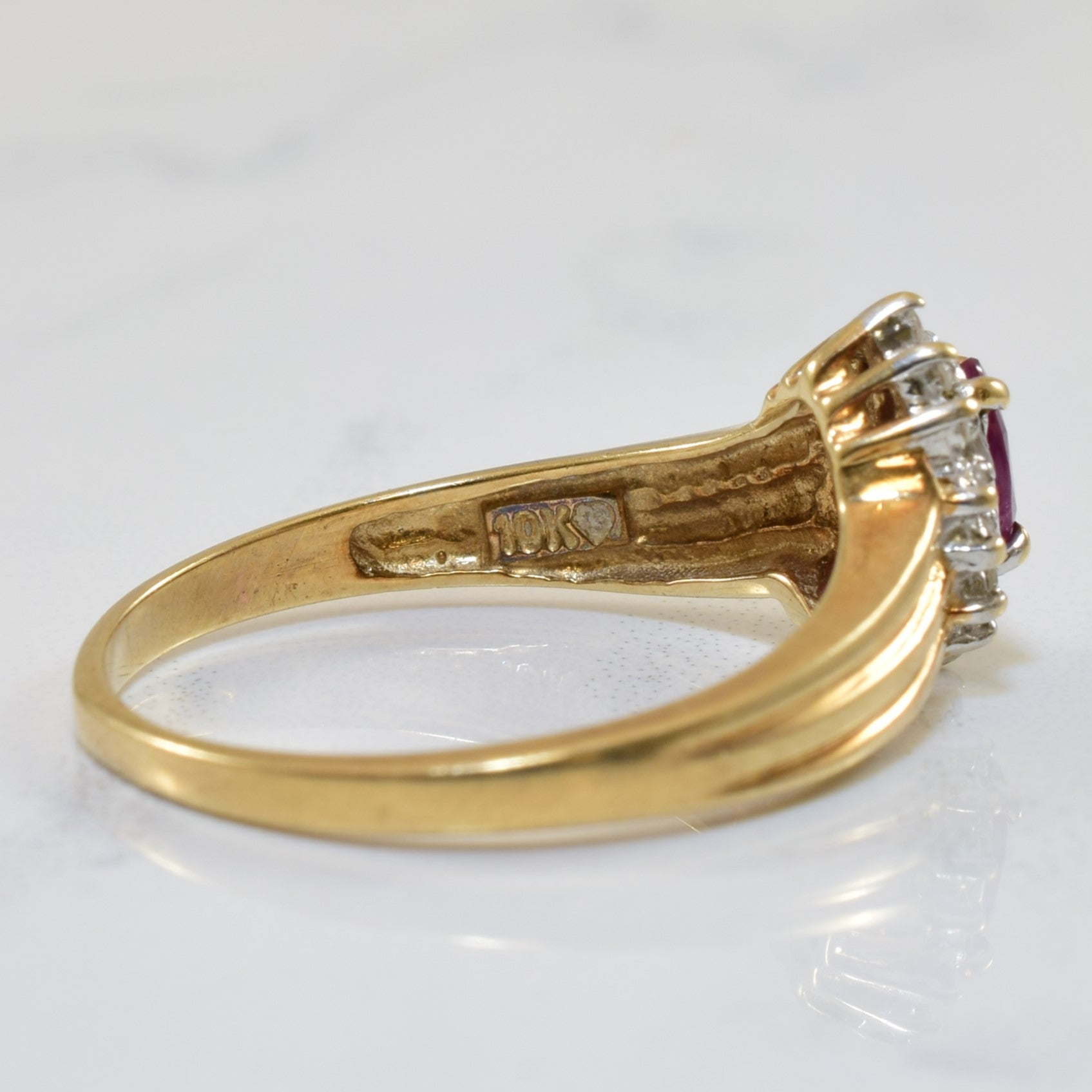 Marquise Ruby & Diamond Halo Ring | 0.25ct, 0.07ctw | SZ 8 |