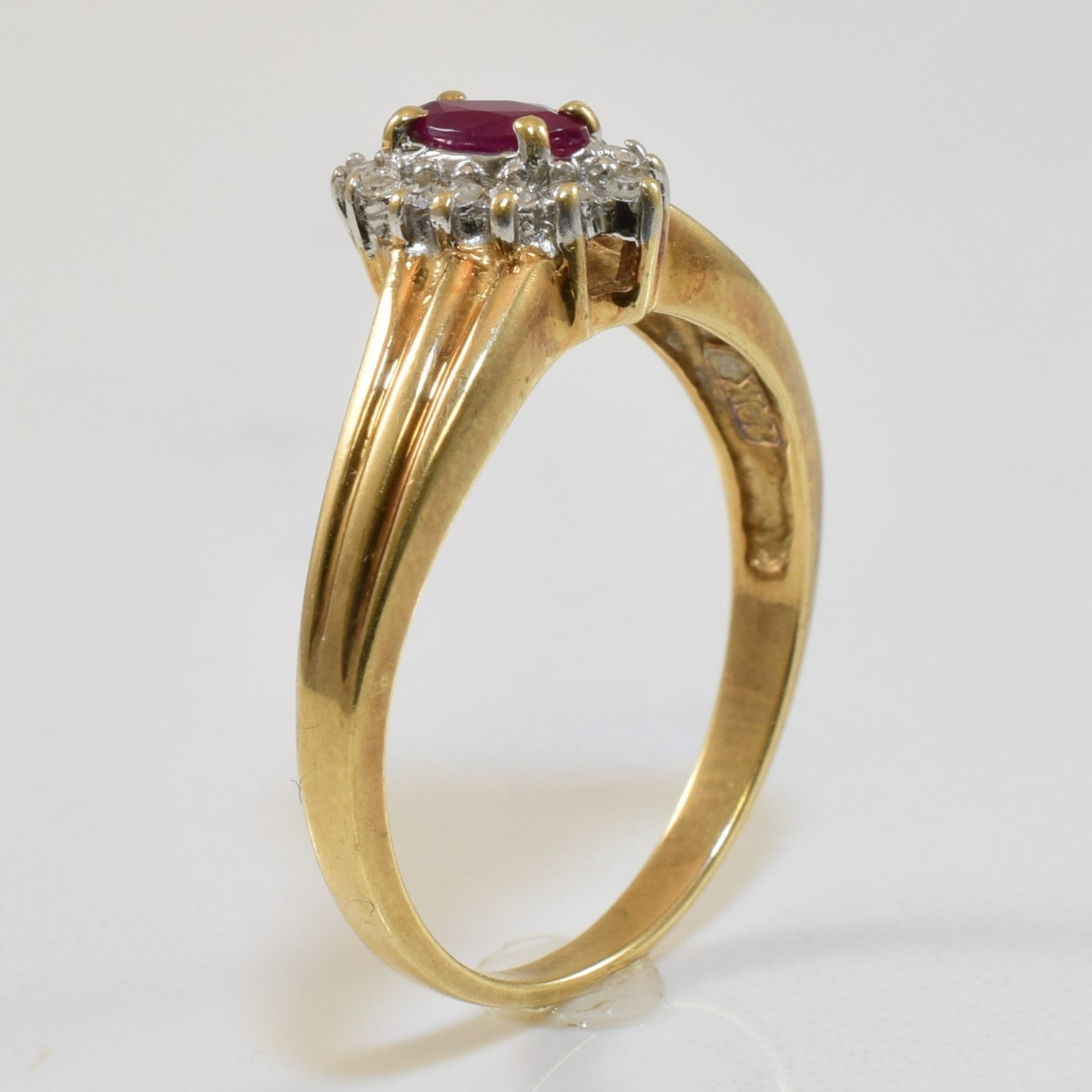 Marquise Ruby & Diamond Halo Ring | 0.25ct, 0.07ctw | SZ 8 |