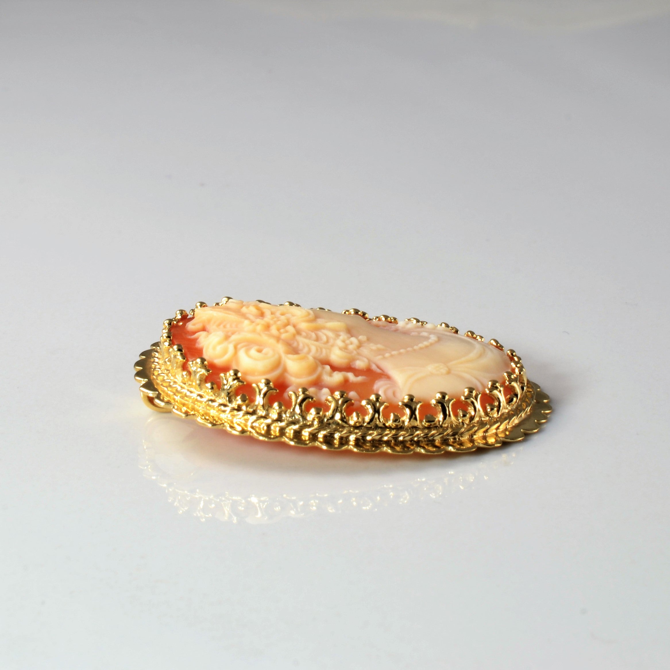 Ornate Bezel Set Cameo Pendant |