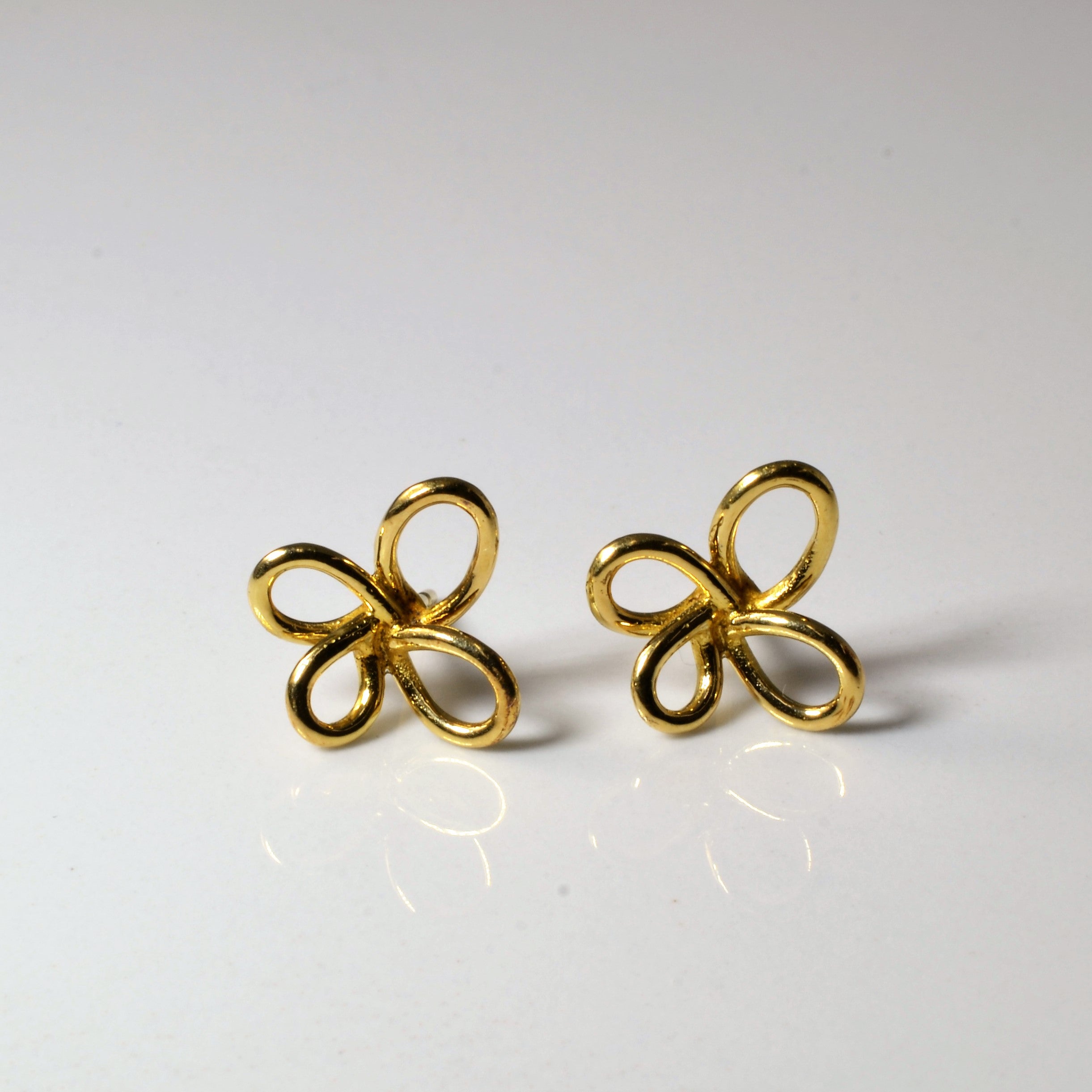 Boucles d'oreilles à clous florales abstraites |