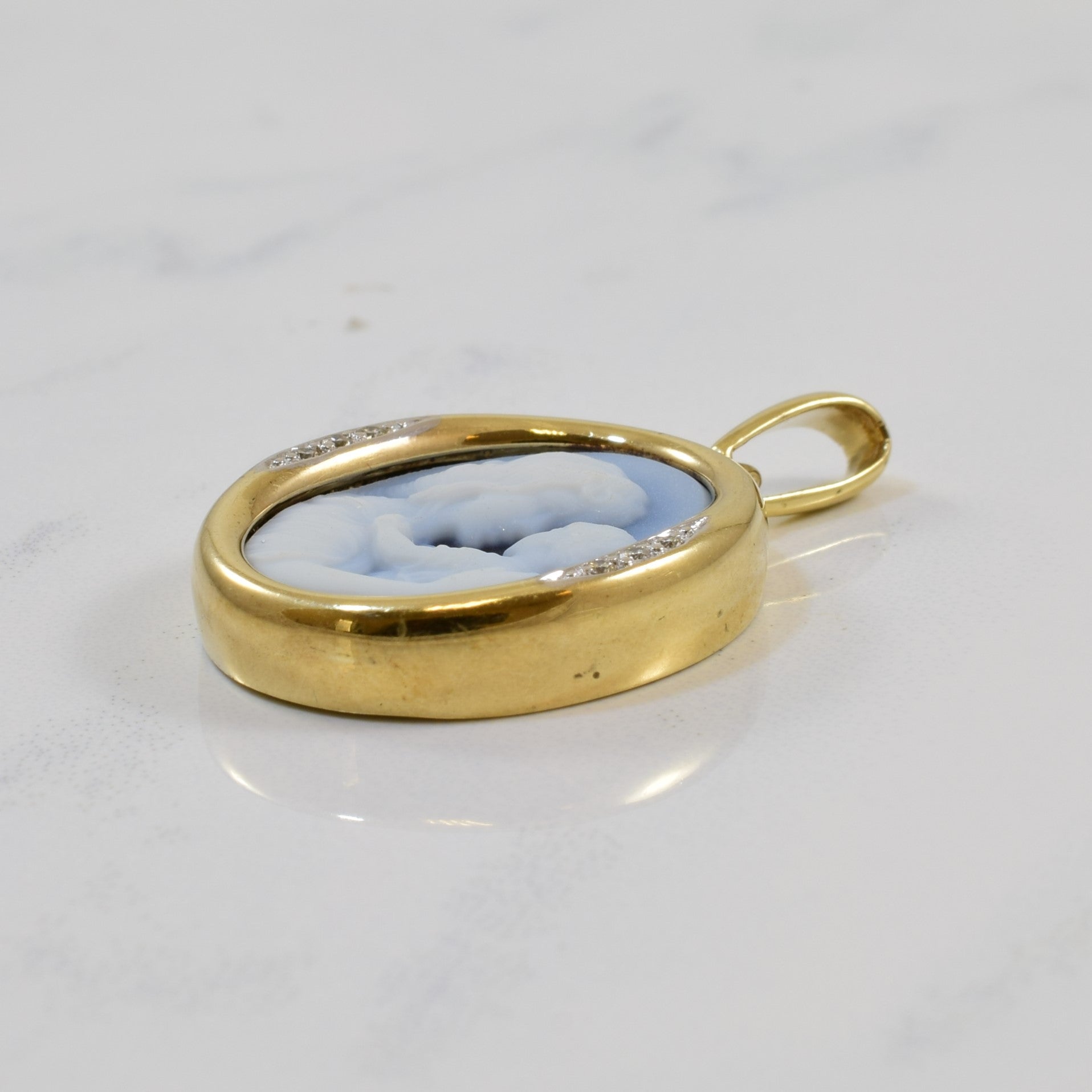 Pendentif camée en onyx et diamant mère et fille |
