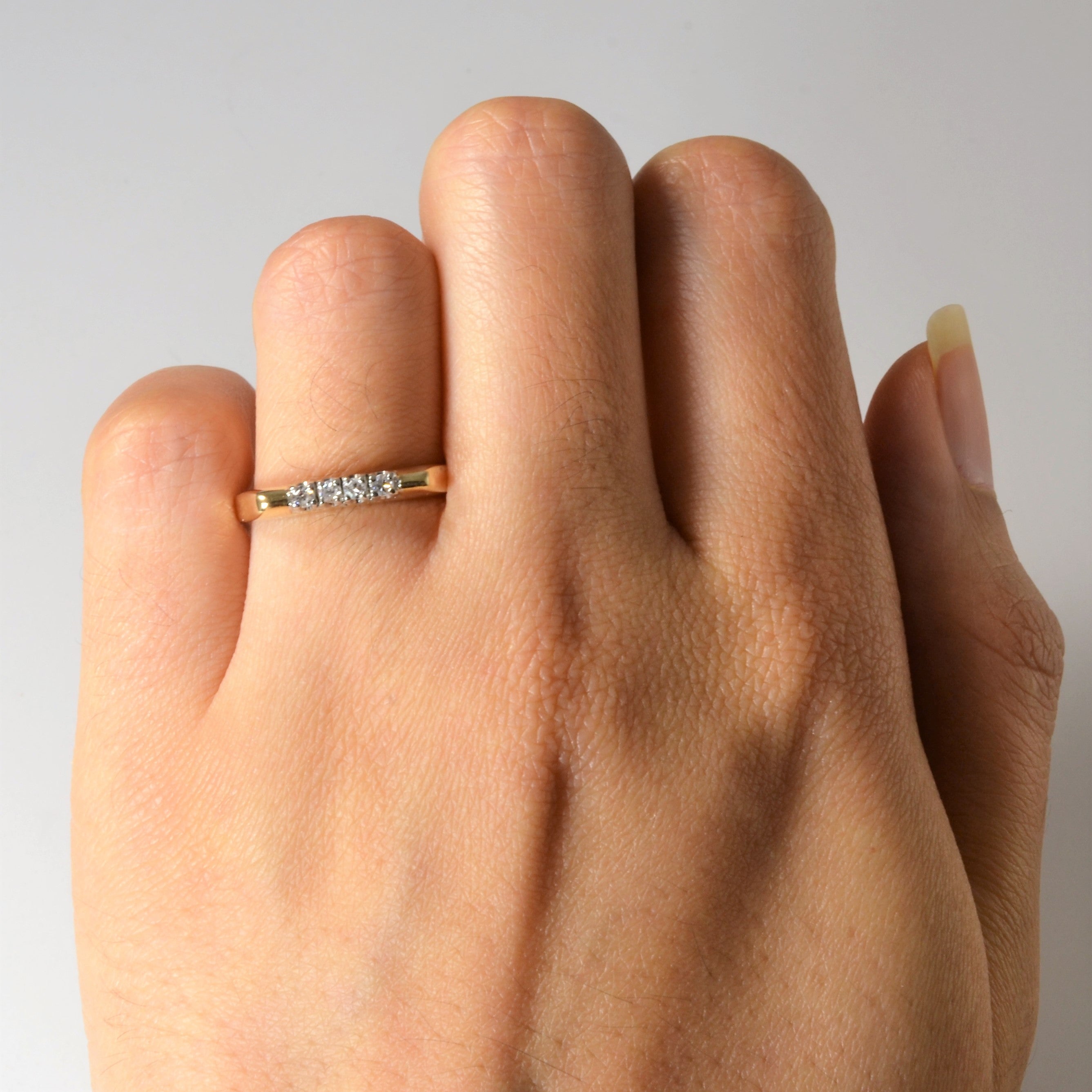 Four Stone Diamond Band | 0.08ctw | SZ 6.75 |