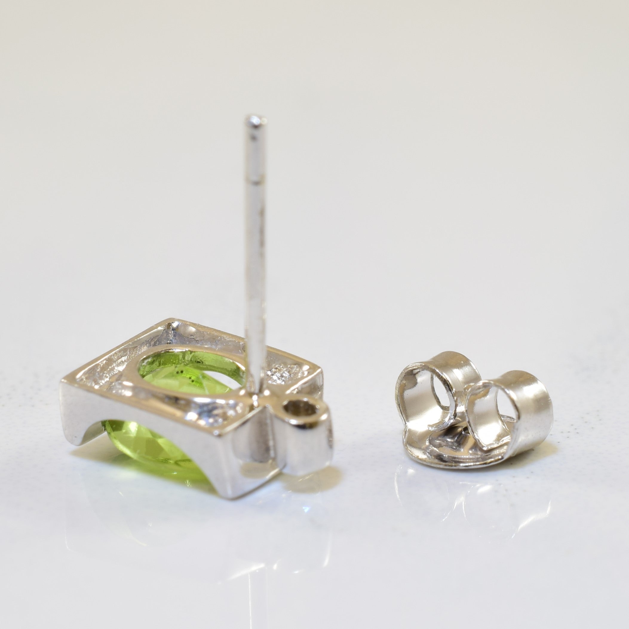 Tension Set Peridot & Diamond Stud Earrings | 1.40ctw, 0.02ctw |