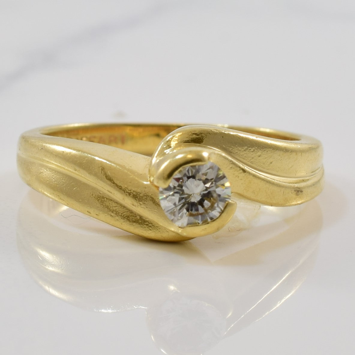 Bague solitaire diamant avec serti contourné | 0,23 ct | Taille 4,5 |