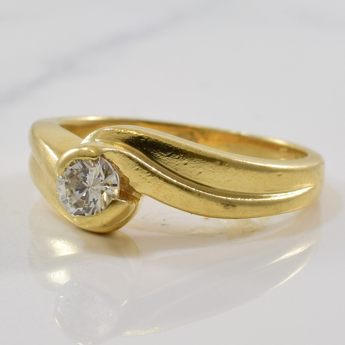 Bague solitaire diamant avec serti contourné | 0,23 ct | Taille 4,5 |