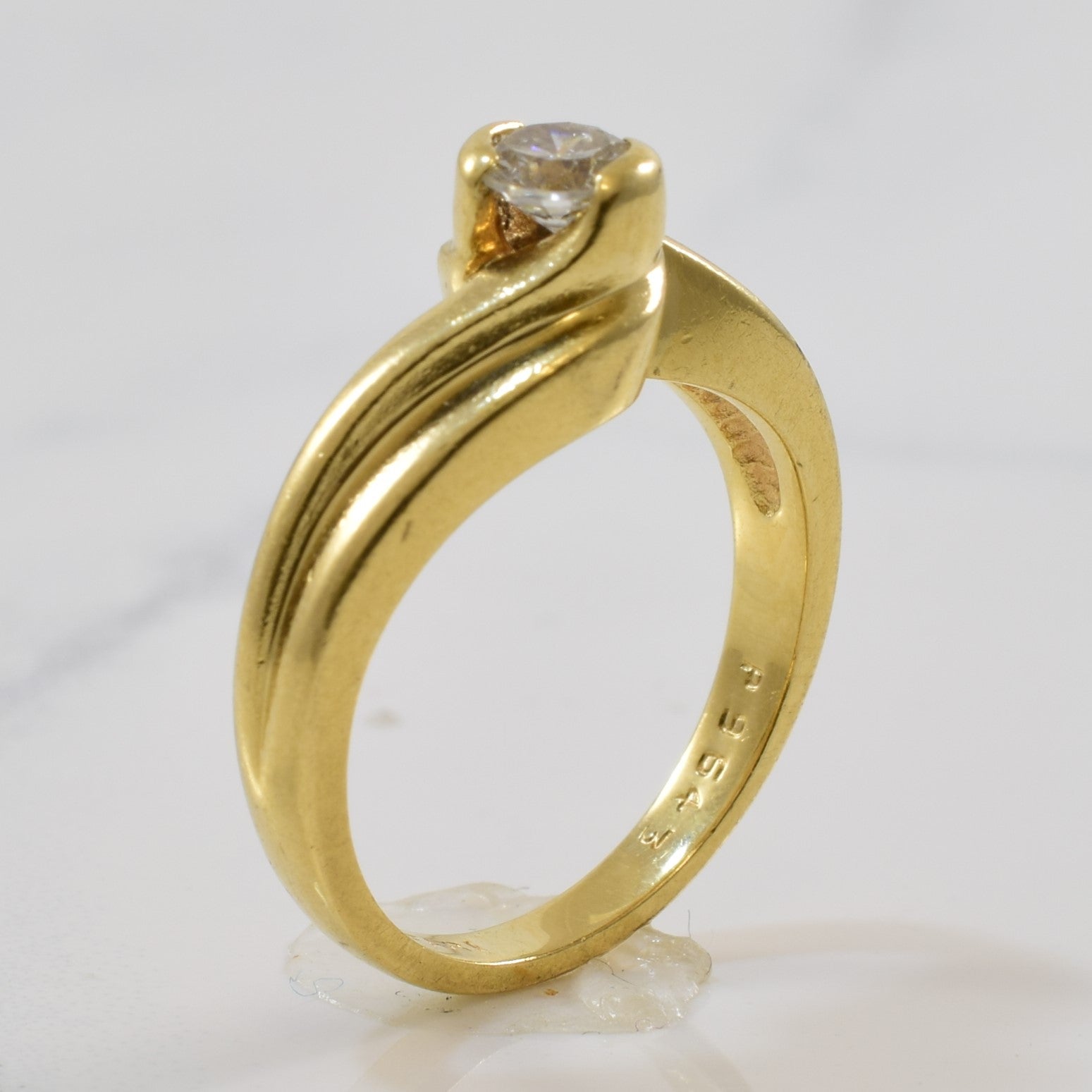 Bague solitaire diamant avec serti contourné | 0,23 ct | Taille 4,5 |