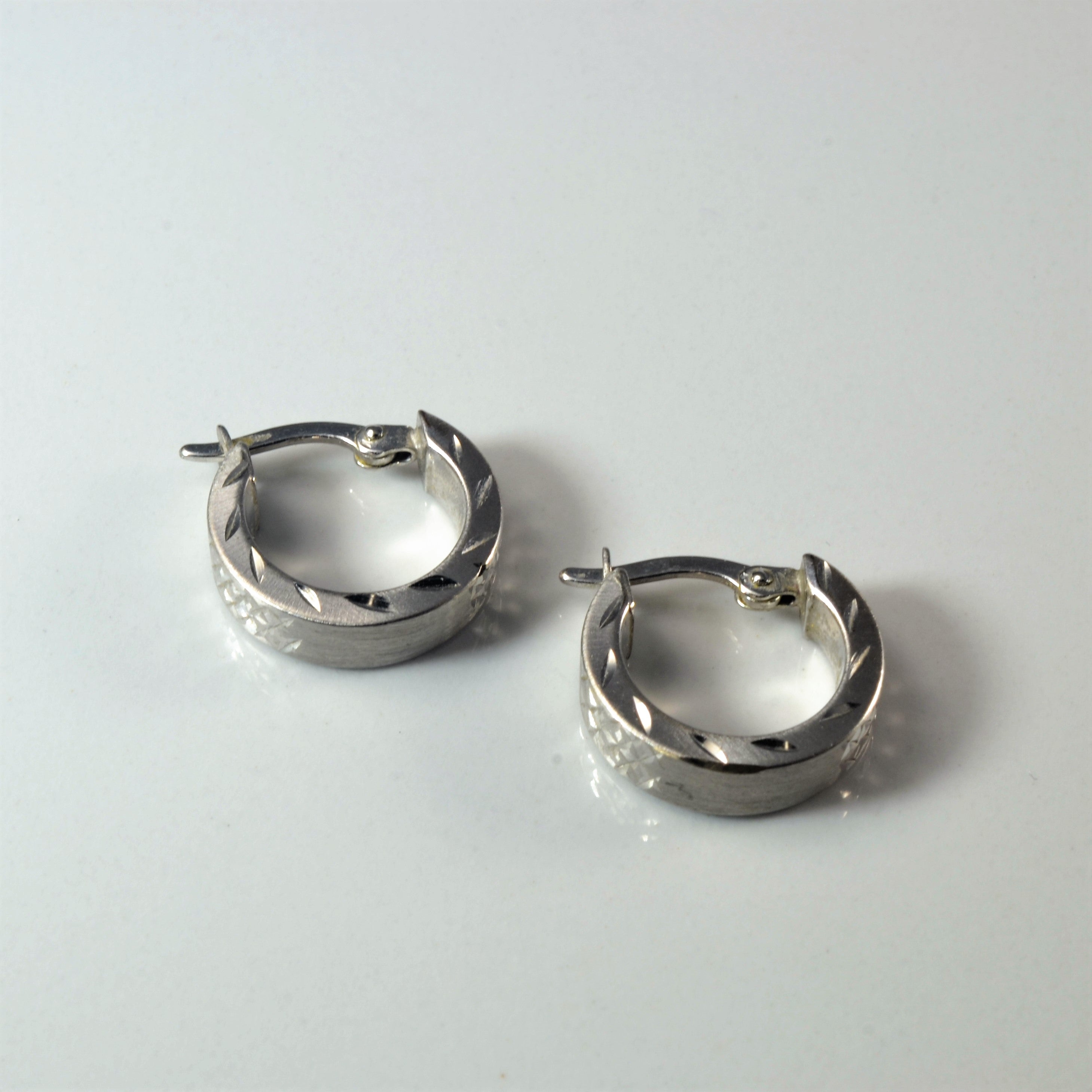White Gold Textured Huggie Earrings |